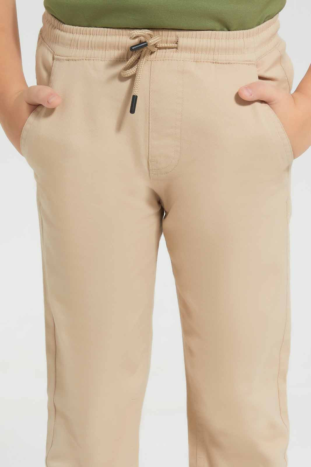 Redtag-Beige-Twill-Stretch-Jogger-BOY-Trousers,-Category:Trousers,-Colour:Beige,-Deals:New-In,-Filter:Boys-(2-to-8-Yrs),-New-In-BOY-APL,-Non-Sale,-Section:Boys-(0-to-14Yrs),-VLM,-W22O-Boys-2 to 8 Years