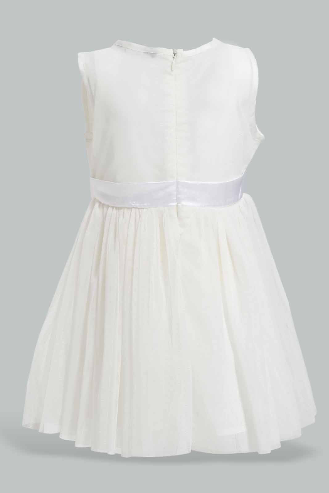 Redtag-White-Sleeveless-Mesh-Dress-With-Rosset-At-Belt-Category:Dresses,-Colour:White,-Deals:New-In,-EID,-Filter:Infant-Girls-(3-to-24-Mths),-ING-Dresses,-New-In-ING-APL,-Non-Sale,-Section:Girls-(0-to-14Yrs),-W22O-Infant-Girls-3 to 24 Months