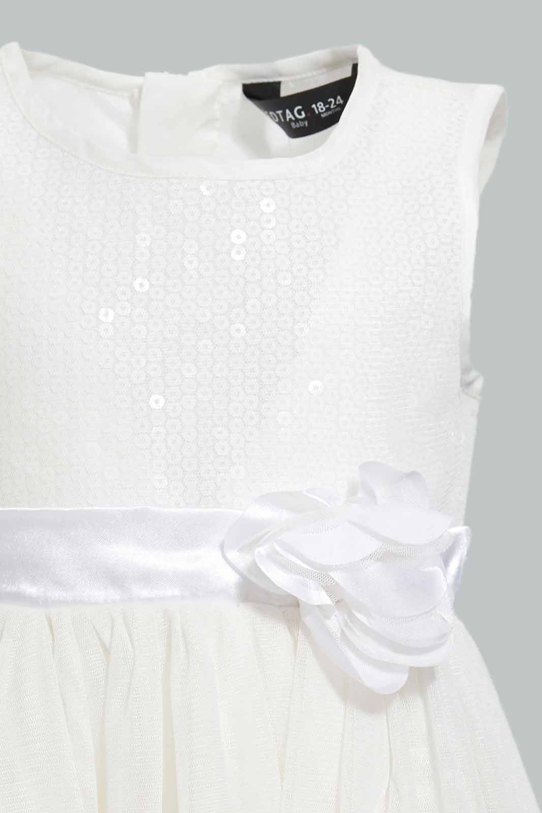 Redtag-White-Sleeveless-Mesh-Dress-With-Rosset-At-Belt-Category:Dresses,-Colour:White,-Deals:New-In,-EID,-Filter:Infant-Girls-(3-to-24-Mths),-ING-Dresses,-New-In-ING-APL,-Non-Sale,-Section:Girls-(0-to-14Yrs),-W22O-Infant-Girls-3 to 24 Months