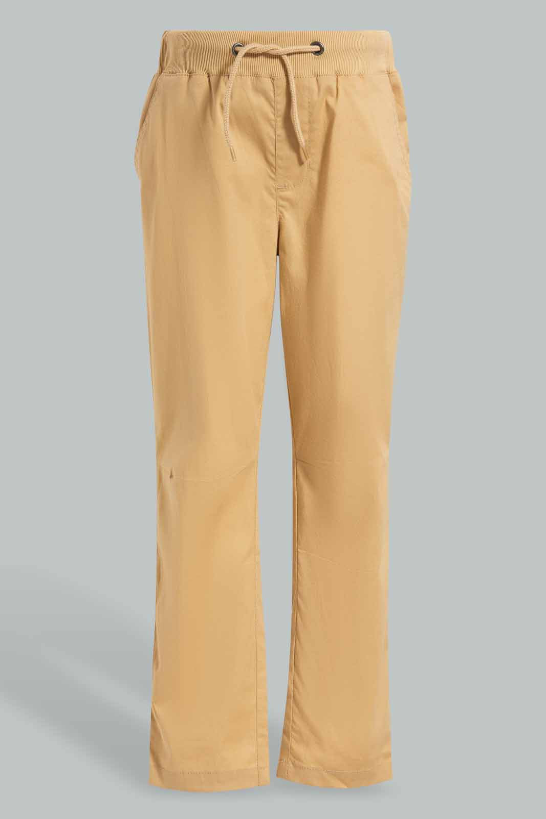 Redtag-Beige-Poplin-Pullon-Trousers-BOY-Trousers,-Category:Trousers,-Colour:Beige,-Deals:New-In,-Filter:Boys-(2-to-8-Yrs),-New-In-BOY-APL,-Non-Sale,-Section:Boys-(0-to-14Yrs),-W22O-Boys-2 to 8 Years