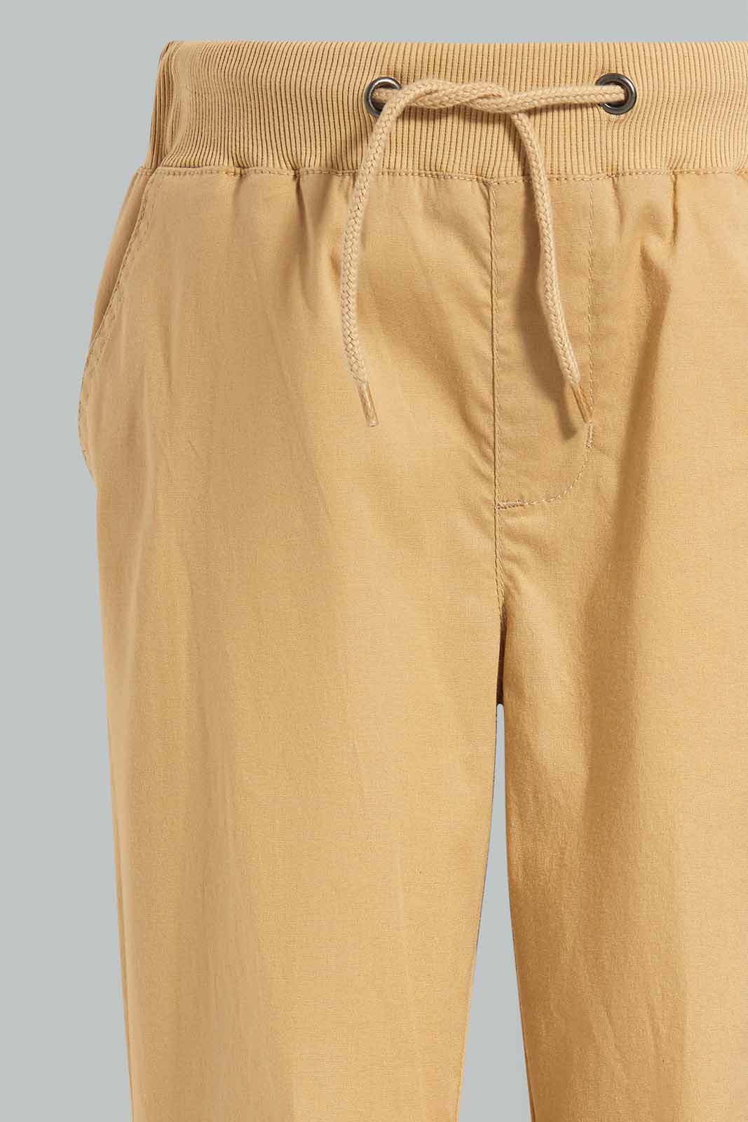 Redtag-Beige-Poplin-Pullon-Trousers-BOY-Trousers,-Category:Trousers,-Colour:Beige,-Deals:New-In,-Filter:Boys-(2-to-8-Yrs),-New-In-BOY-APL,-Non-Sale,-Section:Boys-(0-to-14Yrs),-W22O-Boys-2 to 8 Years
