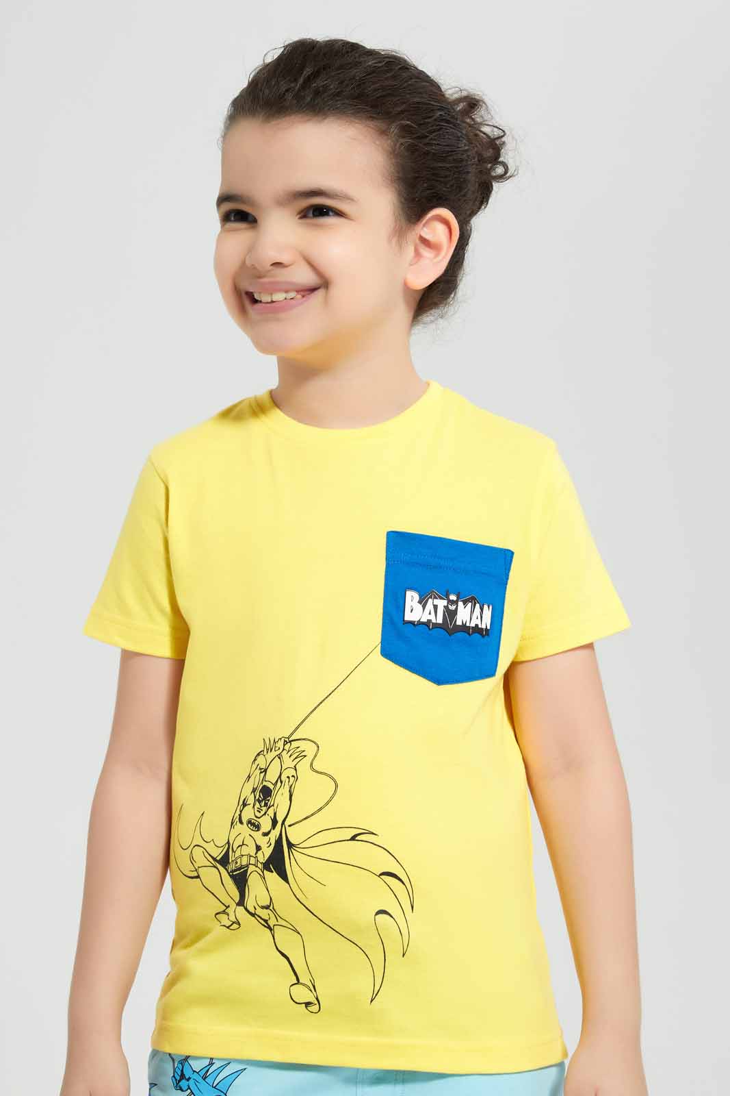 Redtag-Yellow-Batman-Graphic-Pocket-T-Shirt-BOY-T-Shirts,-Category:T-Shirts,-CHR,-Colour:Yellow,-Deals:New-In,-Filter:Boys-(2-to-8-Yrs),-New-In-BOY-APL,-Non-Sale,-Section:Boys-(0-to-14Yrs),-TBL,-W22O-Boys-2 to 8 Years