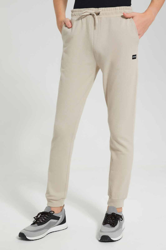 Redtag-Beige-Pique-Active-Pant-BSR-Joggers,-Category:Joggers,-Colour:Beige,-Deals:New-In,-Filter:Senior-Boys-(9-to-14-Yrs),-New-In-BSR-APL,-Non-Sale,-Section:Boys-(0-to-14Yrs),-VLM,-W22O-Senior-Boys-9 to 14 Years