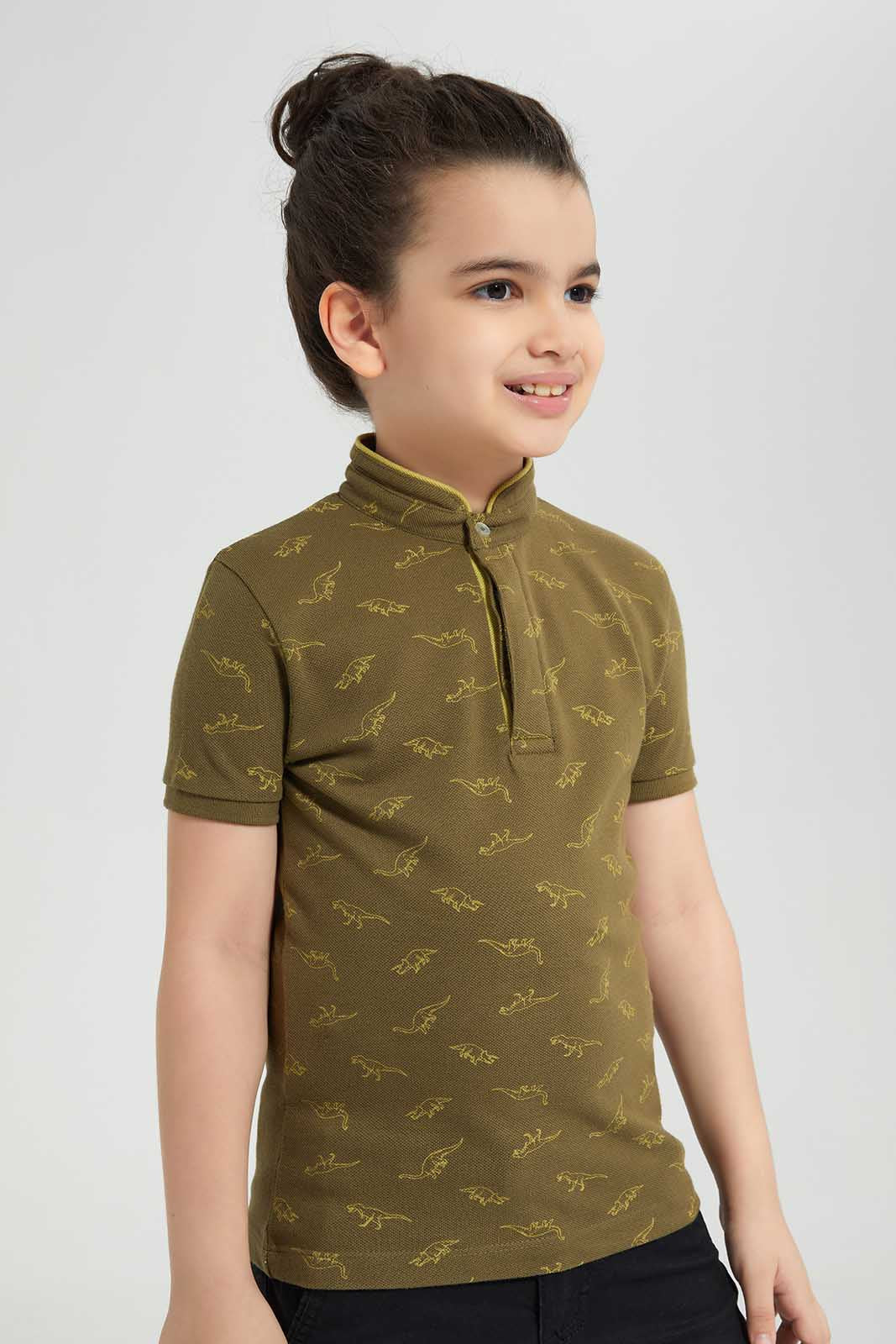 Redtag-Olive-Dino-AOP-Stand-up-Collar-Polo-T-Shirt-BOY-Polo-T-Shirts,-Category:Polo-T-Shirts,-Colour:Olive,-Deals:New-In,-Filter:Boys-(2-to-8-Yrs),-New-In-BOY-APL,-Non-Sale,-Section:Boys-(0-to-14Yrs),-TBL,-W22O-Boys-2 to 8 Years