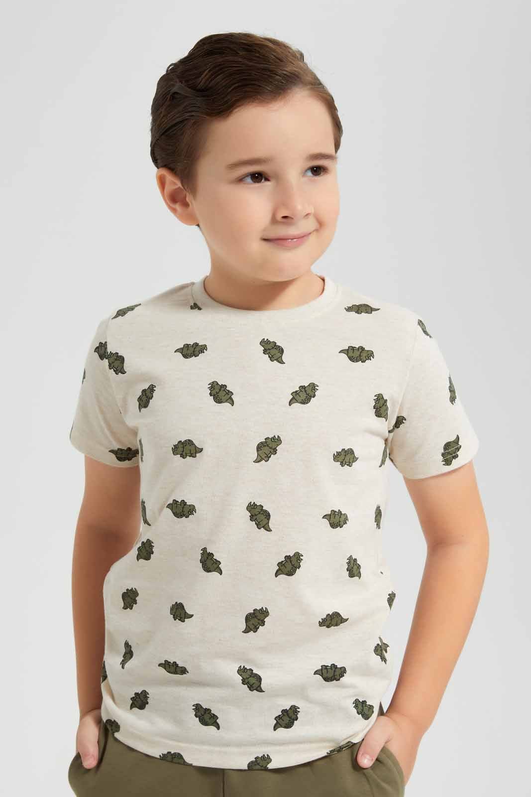 Redtag-Beige-Dino-Print-T-Shirt-And-Shorts-Set-BOY-Sets,-Category:Sets,-Colour:Beige,-Deals:New-In,-Filter:Boys-(2-to-8-Yrs),-New-In-BOY-APL,-Non-Sale,-Section:Boys-(0-to-14Yrs),-W22O-Boys-2 to 8 Years