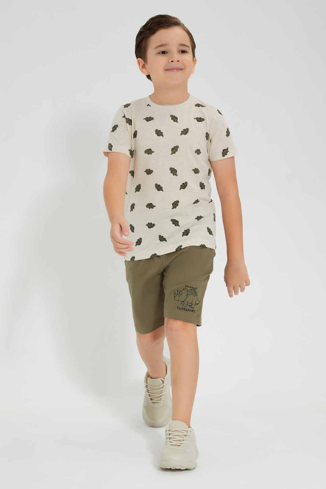Redtag-Beige-Dino-Print-T-Shirt-And-Shorts-Set-BOY-Sets,-Category:Sets,-Colour:Beige,-Deals:New-In,-Filter:Boys-(2-to-8-Yrs),-New-In-BOY-APL,-Non-Sale,-Section:Boys-(0-to-14Yrs),-W22O-Boys-2 to 8 Years