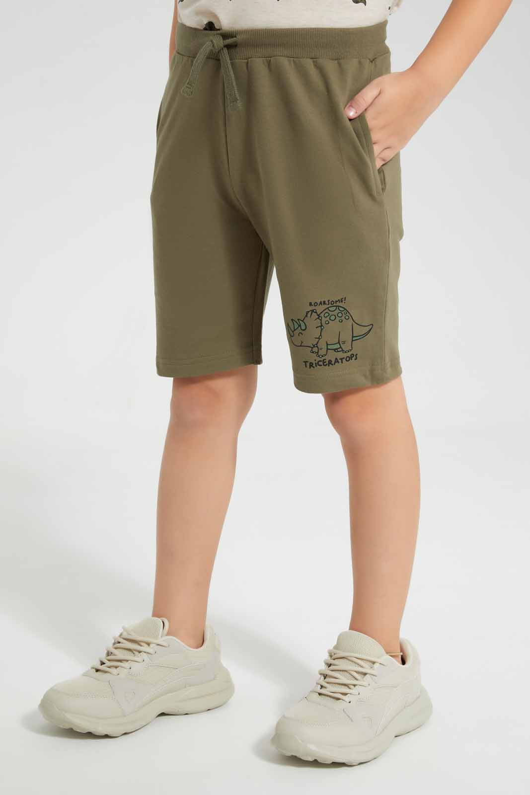 Redtag-Beige-Dino-Print-T-Shirt-And-Shorts-Set-BOY-Sets,-Category:Sets,-Colour:Beige,-Deals:New-In,-Filter:Boys-(2-to-8-Yrs),-New-In-BOY-APL,-Non-Sale,-Section:Boys-(0-to-14Yrs),-W22O-Boys-2 to 8 Years