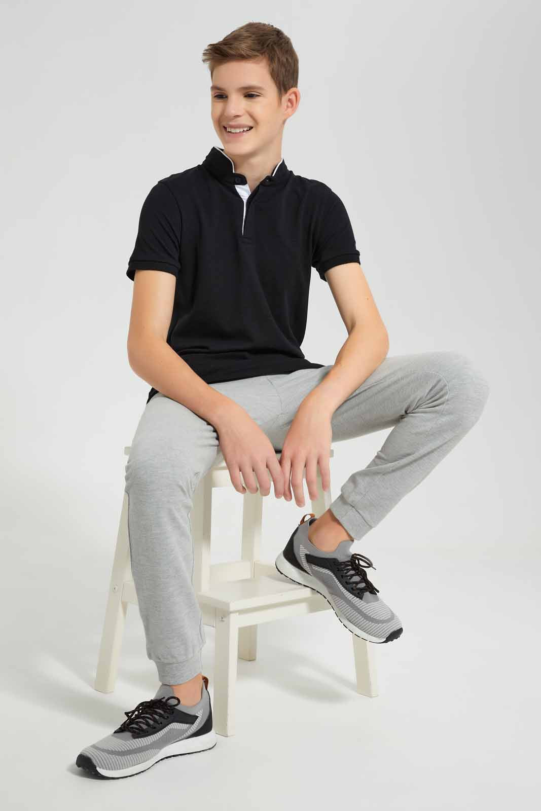 Redtag-Black-Table-Polo-BSR-Polo-T-Shirts,-Category:Polo-T-Shirts,-Colour:Black,-Deals:New-In,-Filter:Senior-Boys-(9-to-14-Yrs),-New-In-BSR-APL,-Non-Sale,-Section:Boys-(0-to-14Yrs),-TBL,-W22O-Senior-Boys-9 to 14 Years