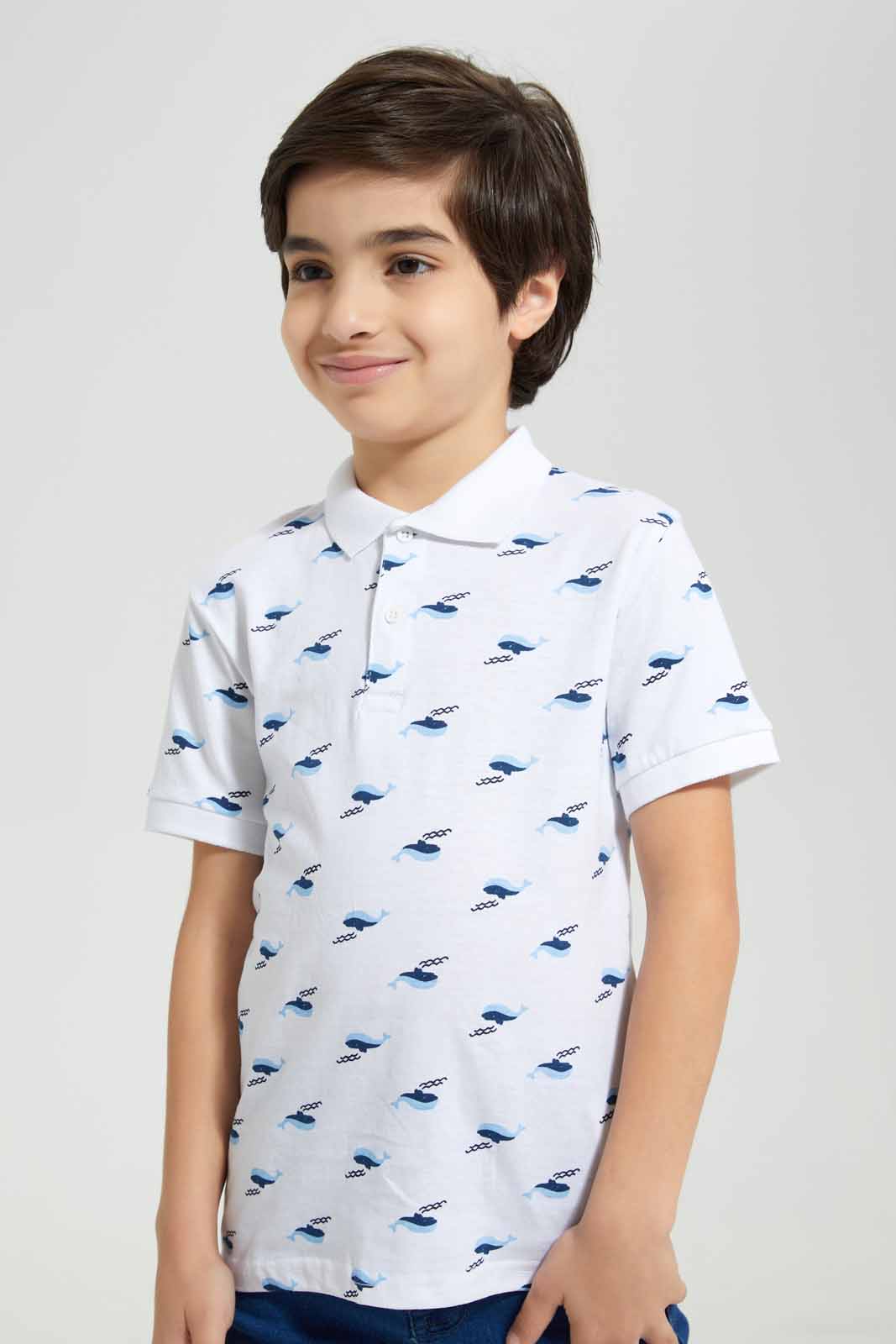 Redtag-White-Dolphin-AOP-SS-SS-Polo-BOY-Polo-T-Shirts,-Category:Polo-T-Shirts,-Colour:White,-Deals:New-In,-Filter:Boys-(2-to-8-Yrs),-New-In-BOY-APL,-Non-Sale,-Section:Boys-(0-to-14Yrs),-W22O-Boys-2 to 8 Years