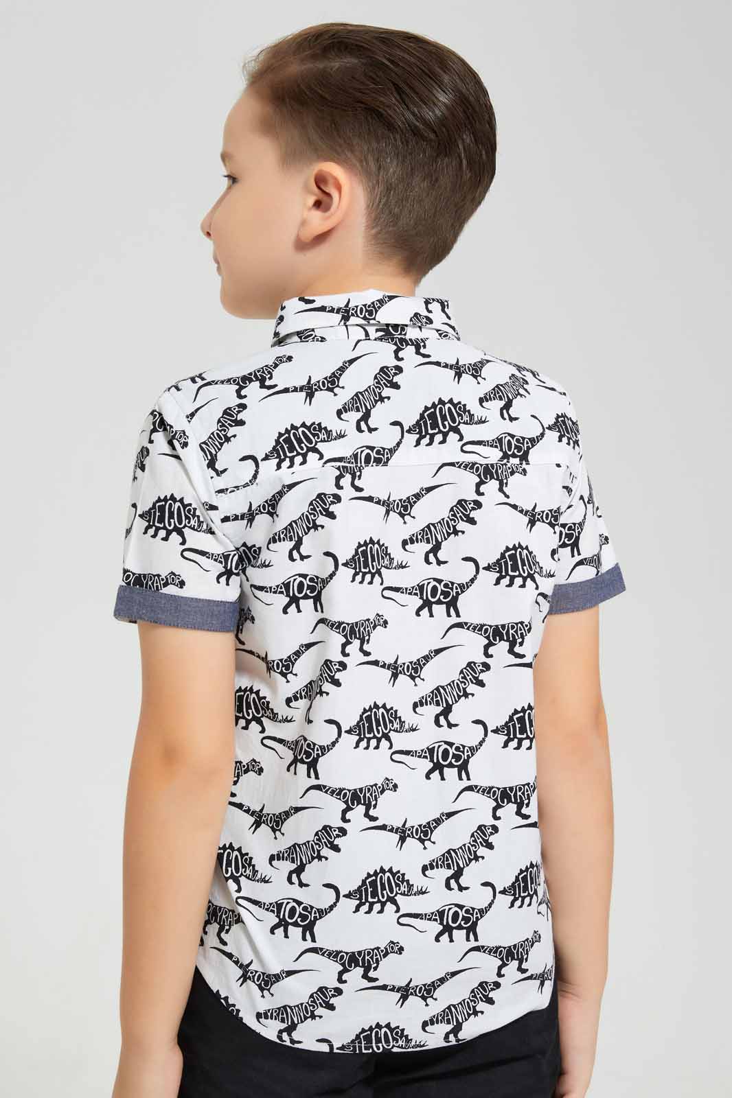 Redtag-White-Dino-Aop-SS-Shirt-BOY-Shirts,-Category:Shirts,-Colour:White,-Deals:New-In,-Filter:Boys-(2-to-8-Yrs),-New-In-BOY-APL,-Non-Sale,-Section:Boys-(0-to-14Yrs),-TBL,-W22O-Boys-2 to 8 Years