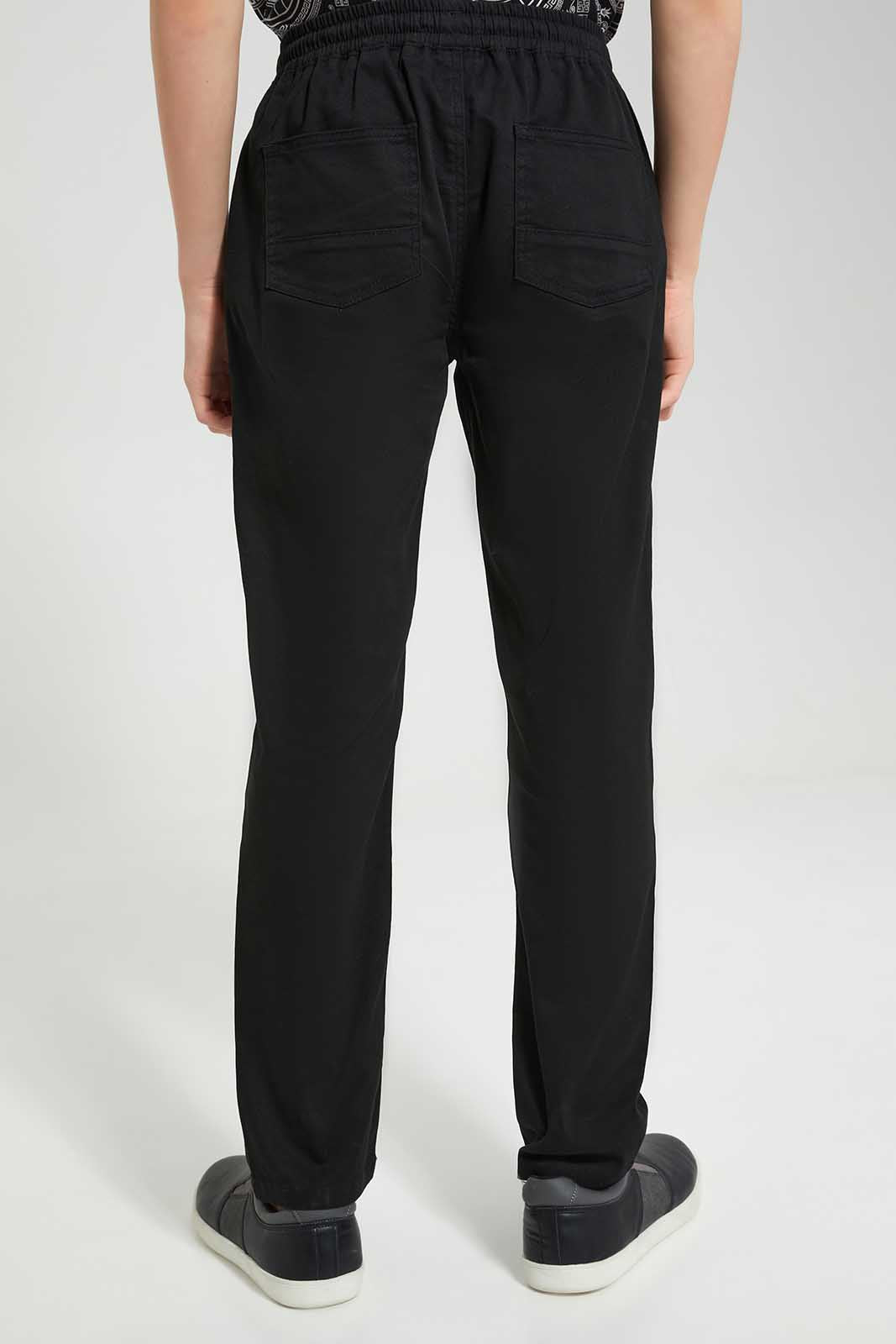 Redtag-Black-Pullon-Casual-Trouser-BSR-Trousers,-Category:Trousers,-Colour:Black,-Deals:New-In,-Filter:Senior-Boys-(8-to-14-Yrs),-New-In-BSR-APL,-Non-Sale,-Section:Boys-(0-to-14Yrs),-TBL,-W22O-Senior-Boys-9 to 14 Years