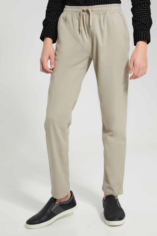 Redtag-Beige-Pullon-Casual-Trouser-BSR-Trousers,-Category:Trousers,-Colour:Beige,-Deals:New-In,-Filter:Senior-Boys-(8-to-14-Yrs),-New-In-BSR-APL,-Non-Sale,-Section:Boys-(0-to-14Yrs),-TBL,-W22O-Senior-Boys-9 to 14 Years