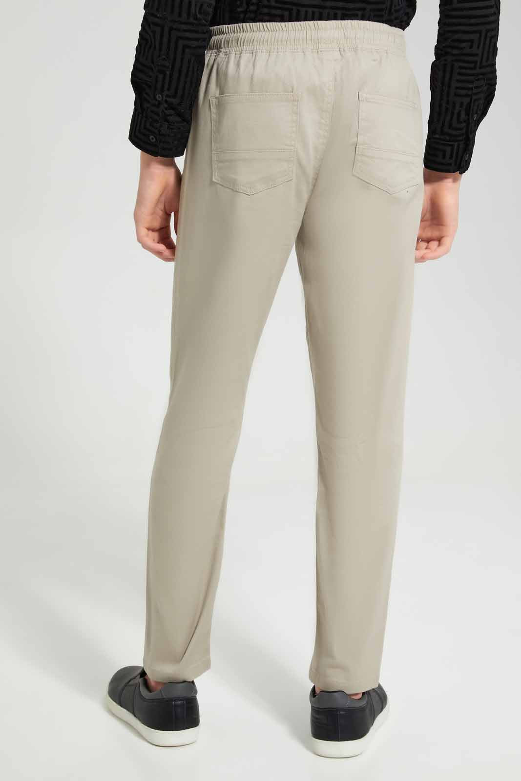 Redtag-Beige-Pullon-Casual-Trouser-BSR-Trousers,-Category:Trousers,-Colour:Beige,-Deals:New-In,-Filter:Senior-Boys-(8-to-14-Yrs),-New-In-BSR-APL,-Non-Sale,-Section:Boys-(0-to-14Yrs),-TBL,-W22O-Senior-Boys-9 to 14 Years