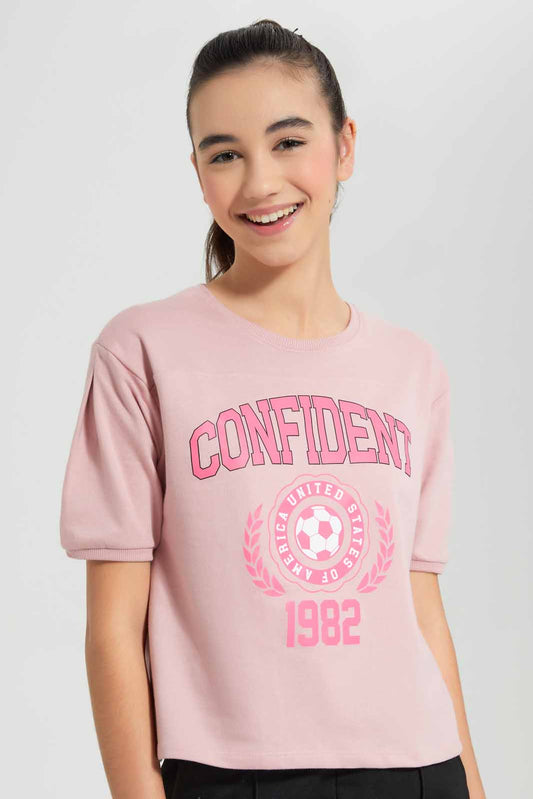 Redtag-Pink-Shortsleeve-Top-Category:T-Shirts,-Colour:Apricot,-Deals:New-In,-Filter:Senior-Girls-(9-to-14-Yrs),-GSR-T-Shirts,-New-In-GSR-APL,-Non-Sale,-Section:Girls-(0-to-14Yrs),-TBL,-W22O-Senior-Girls-9 to 14 Years
