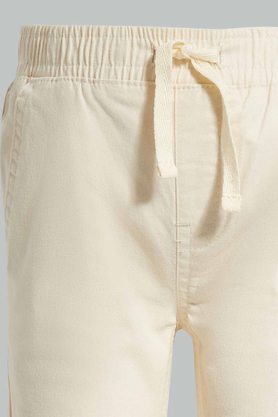 Redtag-Cream-Chino-Jogger-Category:Trousers,-Colour:Cream,-Deals:New-In,-Filter:Infant-Boys-(3-to-24-Mths),-INB-Trousers,-New-In-INB-APL,-Non-Sale,-Section:Boys-(0-to-14Yrs),-W22A-Infant-Boys-3 to 24 Months