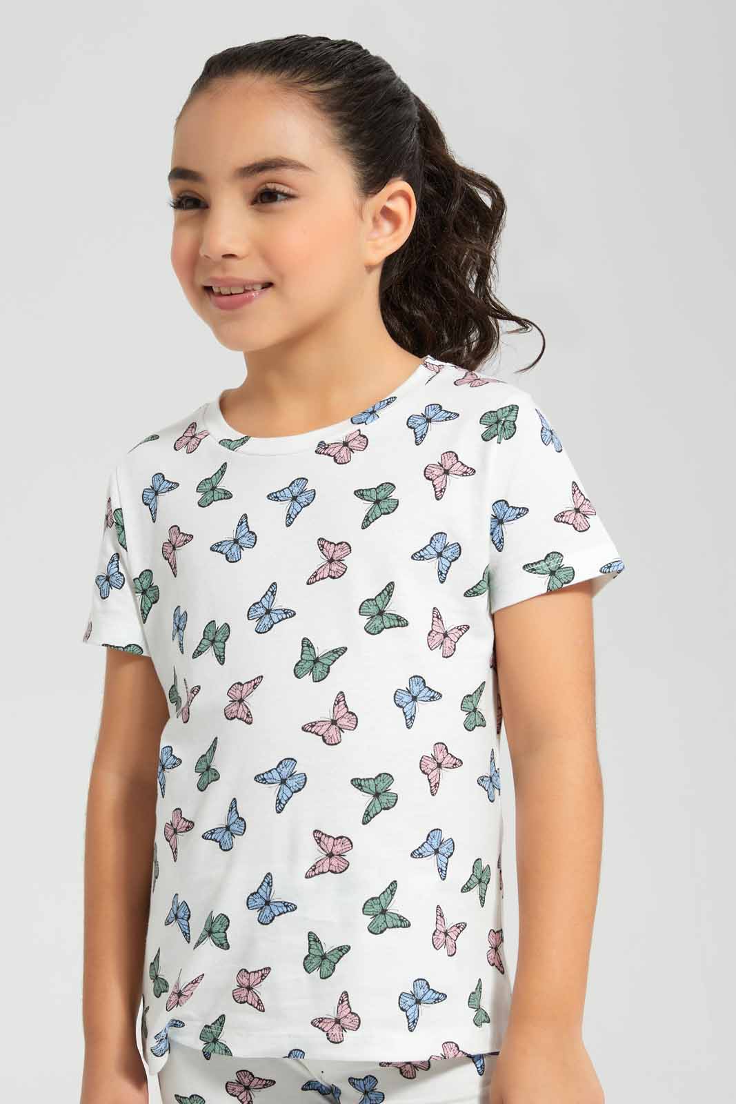 Redtag-Pink-Basic-Butterly-Aop-Tshirt-Category:T-Shirts,-Colour:Apricot,-Deals:New-In,-Filter:Girls-(2-to-8-Yrs),-GIR-T-Shirts,-New-In-GIR-APL,-Non-Sale,-Section:Girls-(0-to-14Yrs),-TBL,-W22O-Girls-2 to 8 Years