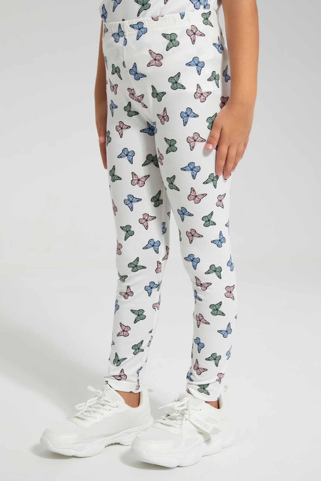 Redtag-Pink-Butterfly-Aop-Legging-Category:Jeggings,-Colour:Apricot,-Deals:New-In,-Filter:Girls-(2-to-8-Yrs),-GIR-Jeggings,-New-In-GIR-APL,-Non-Sale,-Section:Girls-(0-to-14Yrs),-TBL,-W22O-Girls-2 to 8 Years
