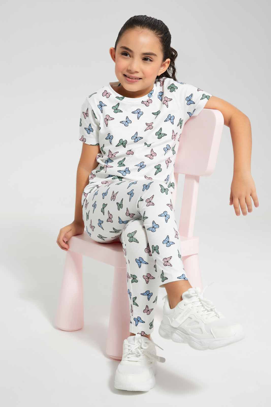 Redtag-Pink-Butterfly-Aop-Legging-Category:Jeggings,-Colour:Apricot,-Deals:New-In,-Filter:Girls-(2-to-8-Yrs),-GIR-Jeggings,-New-In-GIR-APL,-Non-Sale,-Section:Girls-(0-to-14Yrs),-TBL,-W22O-Girls-2 to 8 Years