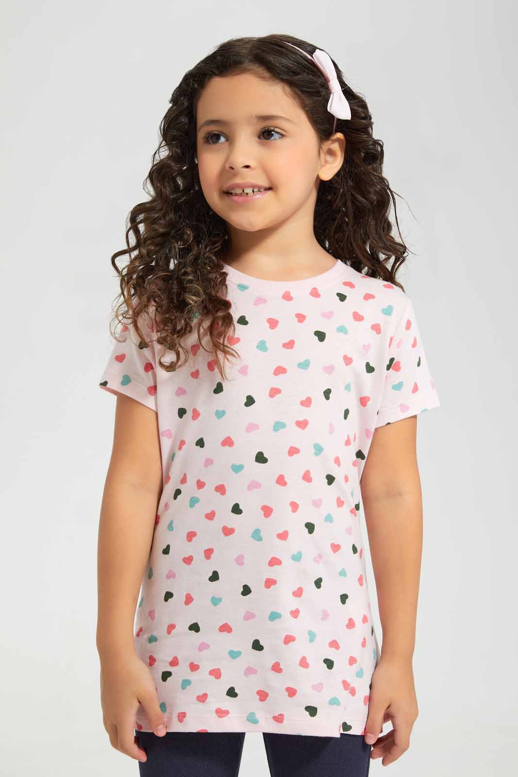 Redtag-Pink-Basic-AOP-Heart-TEE-Category:T-Shirts,-Colour:Apricot,-Deals:New-In,-Filter:Girls-(2-to-8-Yrs),-GIR-T-Shirts,-New-In-GIR-APL,-Non-Sale,-Section:Girls-(0-to-14Yrs),-TBL,-W22O-Girls-2 to 8 Years