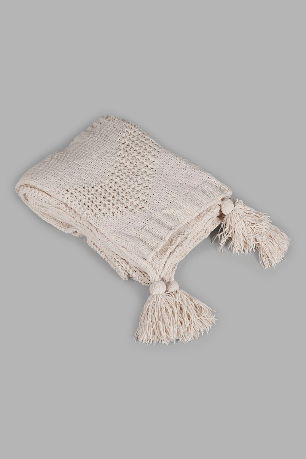 Redtag-Ivory-Knitted-Throw-With-Pom-Pom-Category:Throws,-Colour:Ivory,-Deals:New-In,-Filter:Home-Bedroom,-HMW-BED-Throws,-New-In-HMW-BED,-Non-Sale,-Section:Homewares,-W22A-Home-Bedroom-