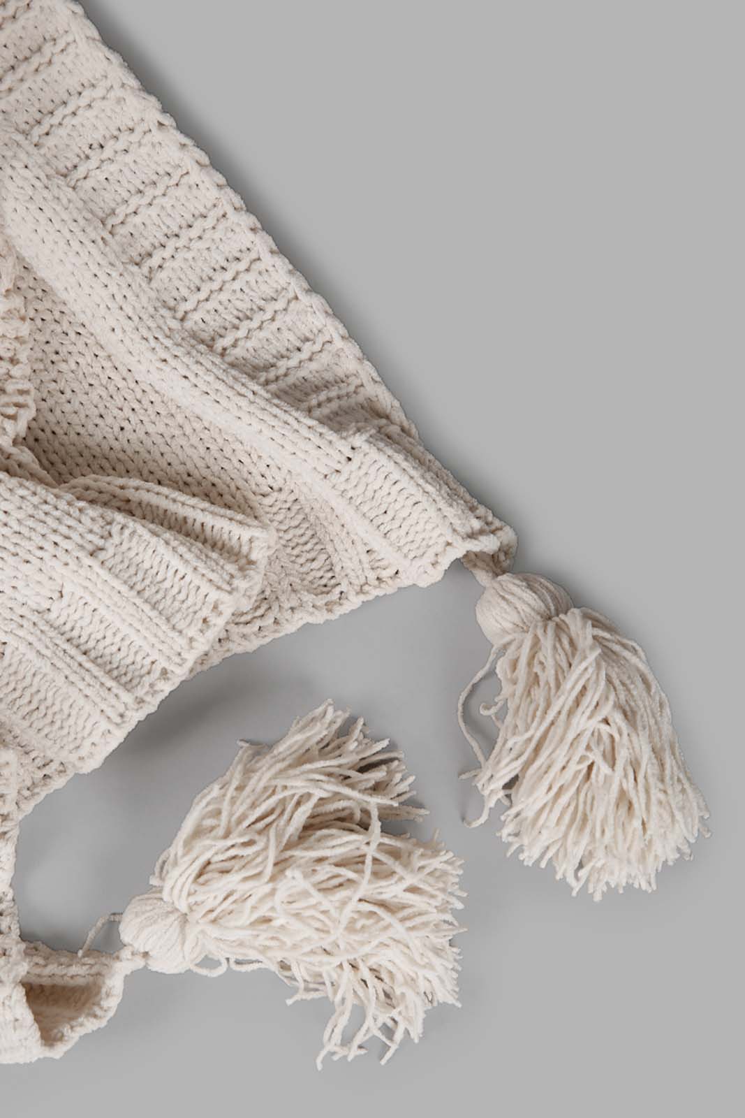 Redtag-Ivory-Knitted-Throw-With-Pom-Pom-Category:Throws,-Colour:Ivory,-Deals:New-In,-Filter:Home-Bedroom,-HMW-BED-Throws,-New-In-HMW-BED,-Non-Sale,-Section:Homewares,-W22A-Home-Bedroom-