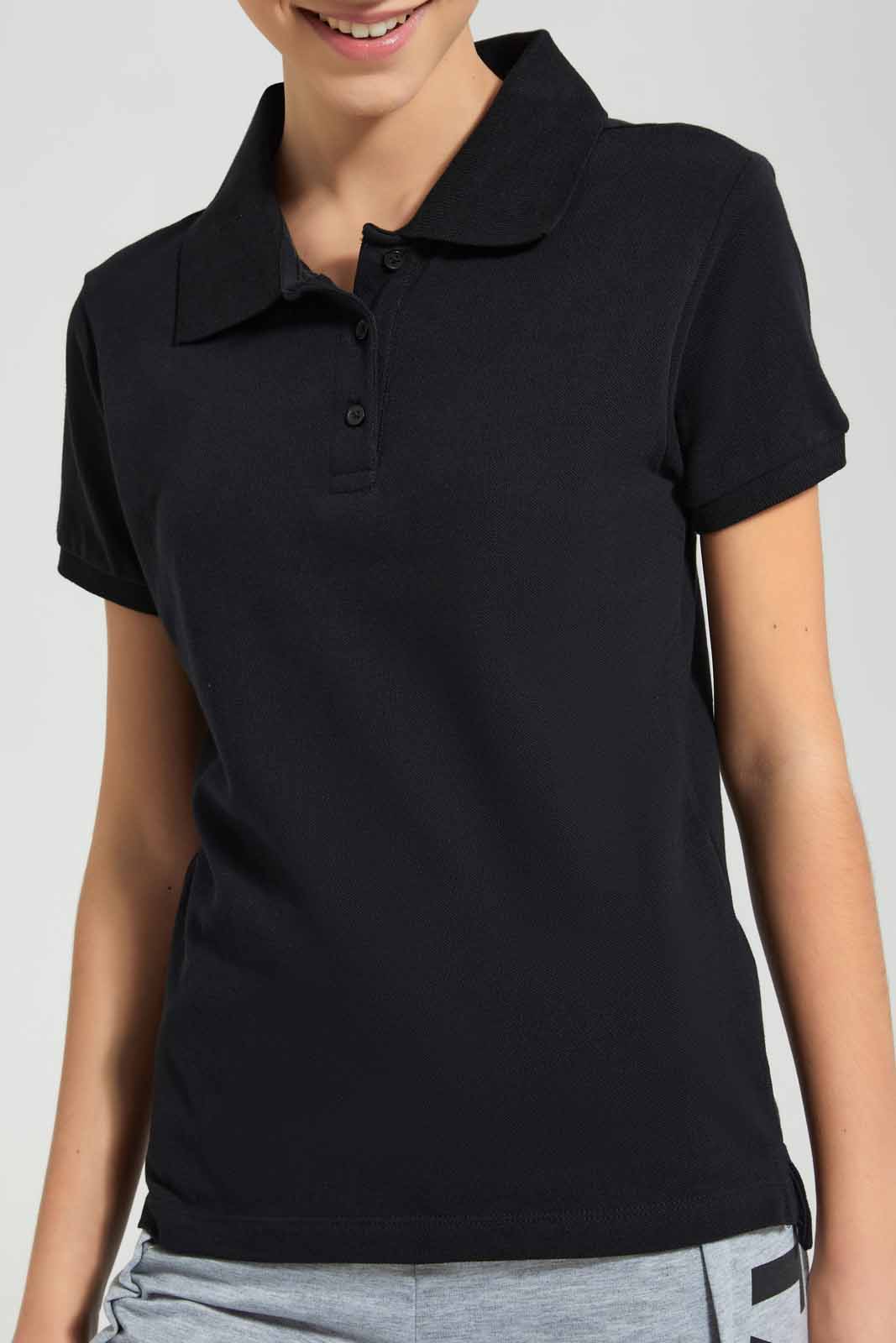 Redtag-Black-Pique-Polo-Category:T-Shirts,-Colour:Black,-Deals:New-In,-Filter:Senior-Girls-(9-to-14-Yrs),-GSR-T-Shirts,-New-In-GSR-APL,-Non-Sale,-Section:Girls-(0-to-14Yrs),-TBL,-W22O-Senior-Girls-9 to 14 Years