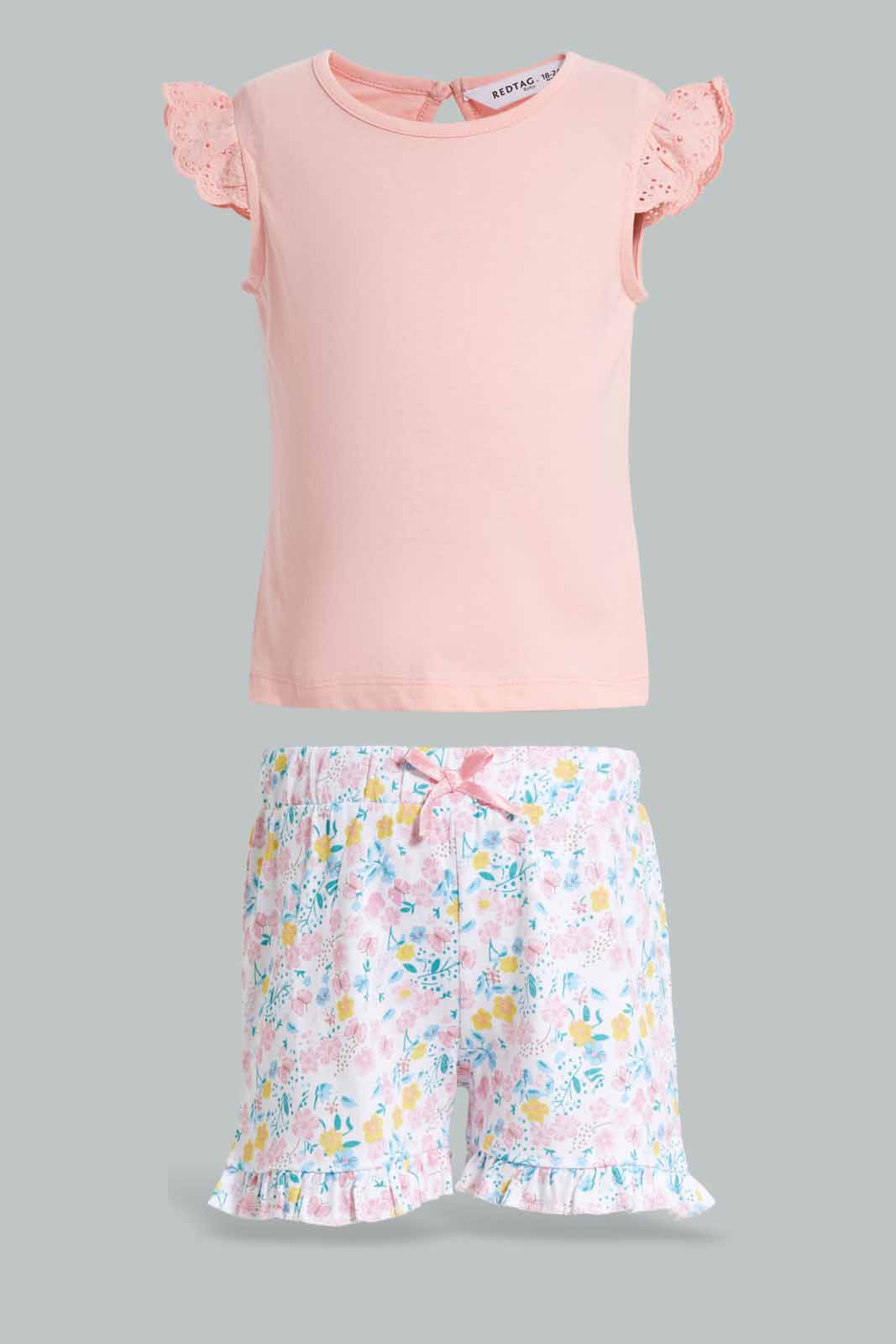 Redtag-Pink-Solid-Schiffli-Frill-Sleeves-T-Shirt-With-Floral-AOP-Shorts-Category:Sets,-Colour:Apricot,-Deals:New-In,-Filter:Infant-Girls-(3-to-24-Mths),-ING-Sets,-New-In-ING-APL,-Non-Sale,-Section:Girls-(0-to-14Yrs),-VLM,-W22O-Infant-Girls-3 to 24 Months