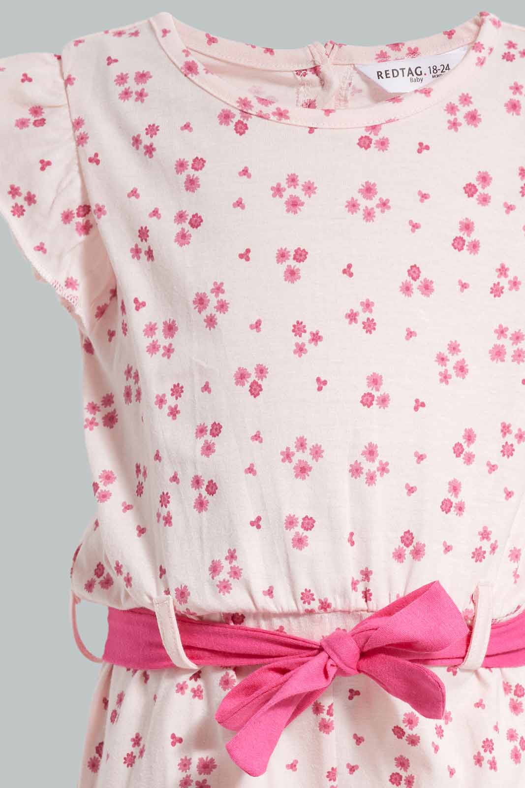 Redtag-Pink-Floral-Print-Jumpsuit-Category:Jumpsuits,-Colour:Apricot,-Deals:New-In,-Filter:Infant-Girls-(3-to-24-Mths),-ING-Jumpsuits,-New-In-ING-APL,-Non-Sale,-Section:Girls-(0-to-14Yrs),-W22O-Infant-Girls-3 to 24 Months