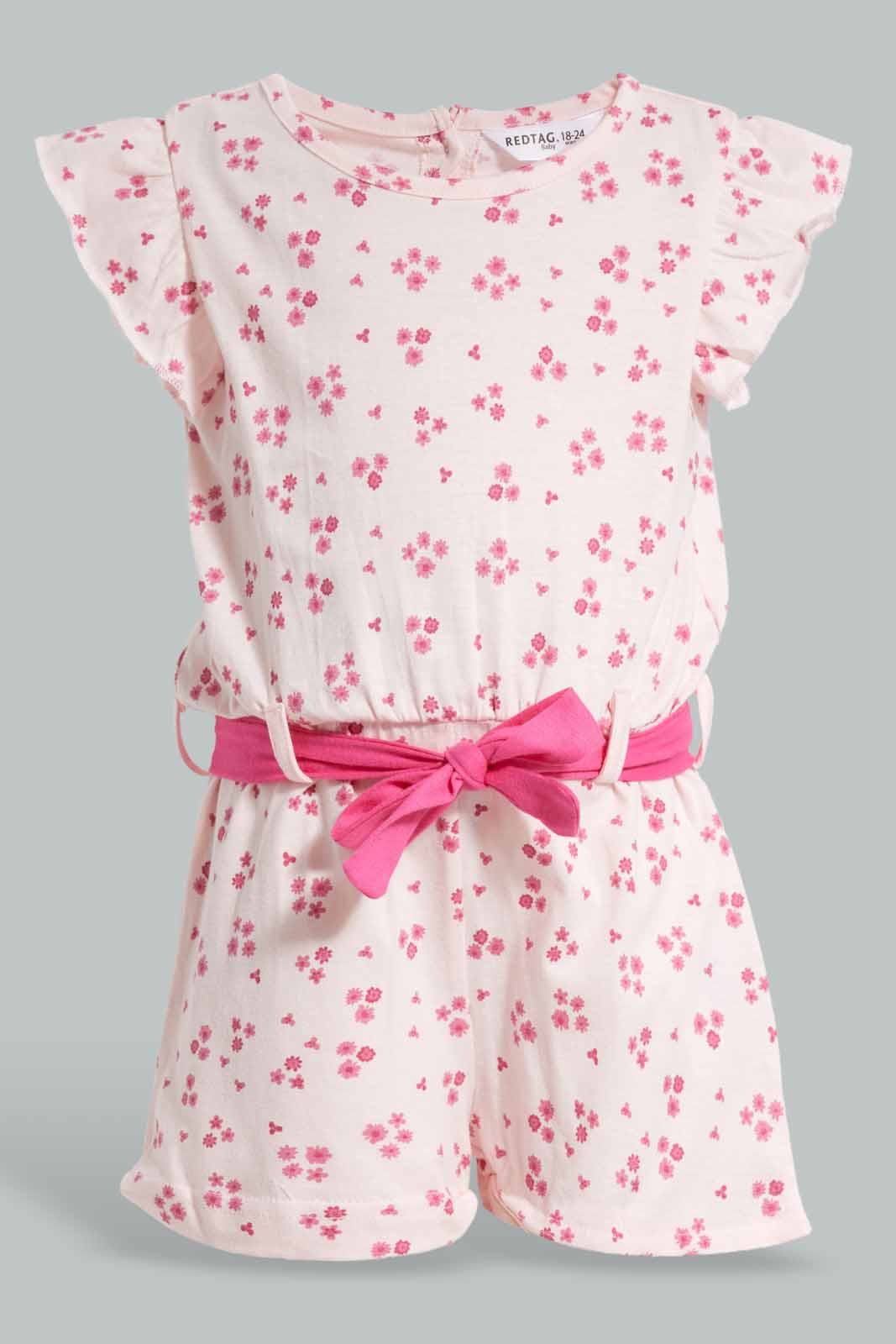 Redtag-Pink-Floral-Print-Jumpsuit-Category:Jumpsuits,-Colour:Apricot,-Deals:New-In,-Filter:Infant-Girls-(3-to-24-Mths),-ING-Jumpsuits,-New-In-ING-APL,-Non-Sale,-Section:Girls-(0-to-14Yrs),-W22O-Infant-Girls-3 to 24 Months