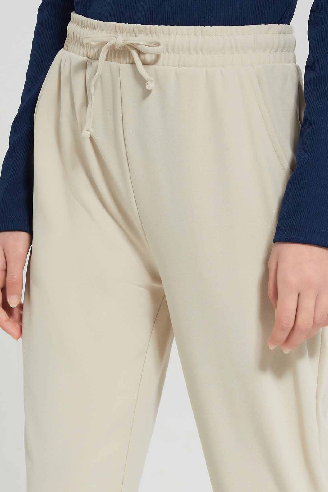 Redtag-Beige-Kintted-Jogger-Category:Joggers,-Colour:Beige,-Deals:New-In,-Filter:Senior-Girls-(8-to-14-Yrs),-GSR-Joggers,-New-In-GSR-APL,-Non-Sale,-Section:Girls-(0-to-14Yrs),-TBL,-W22A-Senior-Girls-9 to 14 Years