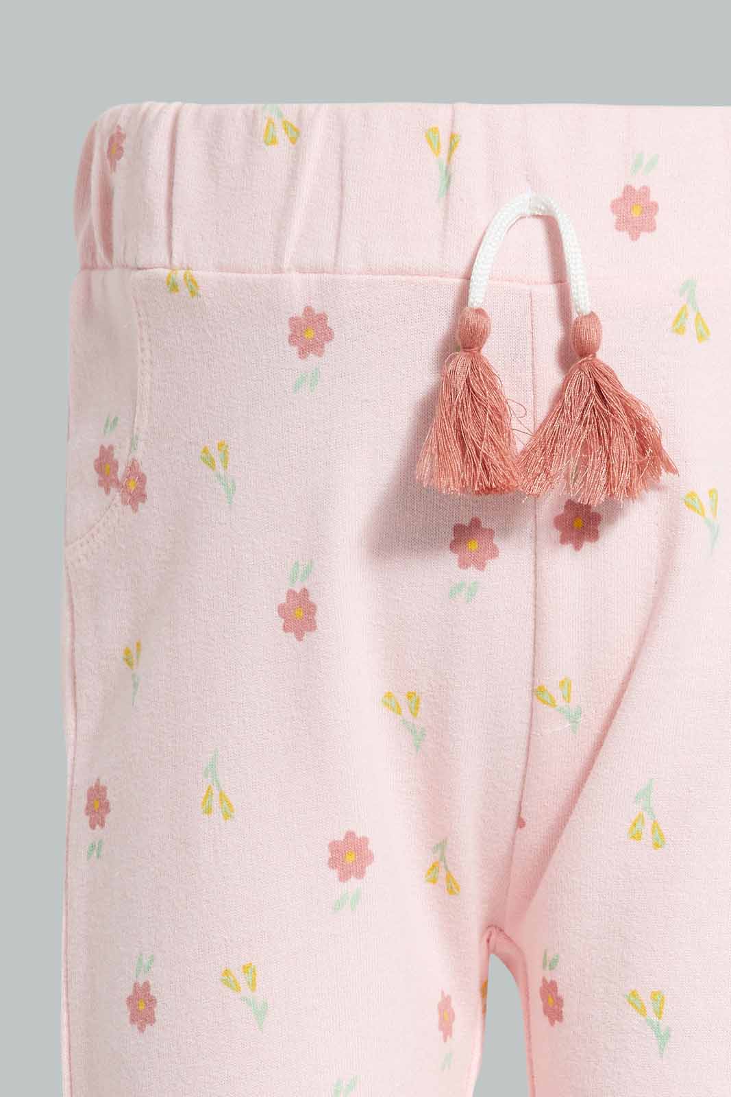 Redtag-Pink-Floral-AOP-Active-Pant-Category:Joggers,-Colour:Apricot,-Deals:New-In,-Filter:Infant-Girls-(3-to-24-Mths),-ING-Joggers,-New-In-ING-APL,-Non-Sale,-Section:Girls-(0-to-14Yrs),-TBL,-W22A-Infant-Girls-3 to 24 Months