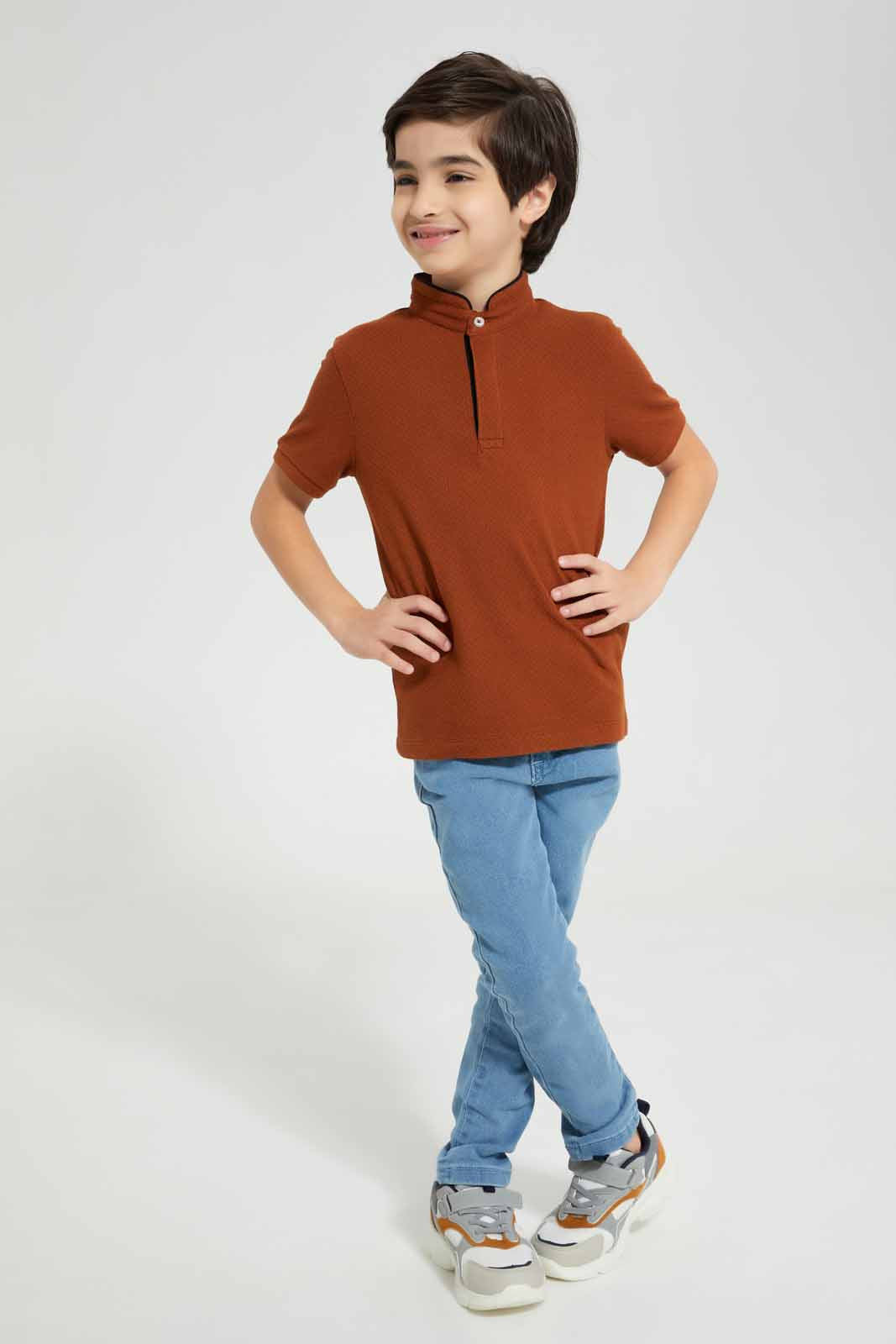 Redtag-Brown-AOP-Stand-Up-Collar-Polo-T-Shirt-BOY-Polo-T-Shirts,-Category:Polo-T-Shirts,-Colour:Brown,-Deals:New-In,-Filter:Boys-(2-to-8-Yrs),-New-In-BOY-APL,-Non-Sale,-Section:Boys-(0-to-14Yrs),-TBL,-W22A-Boys-2 to 8 Years