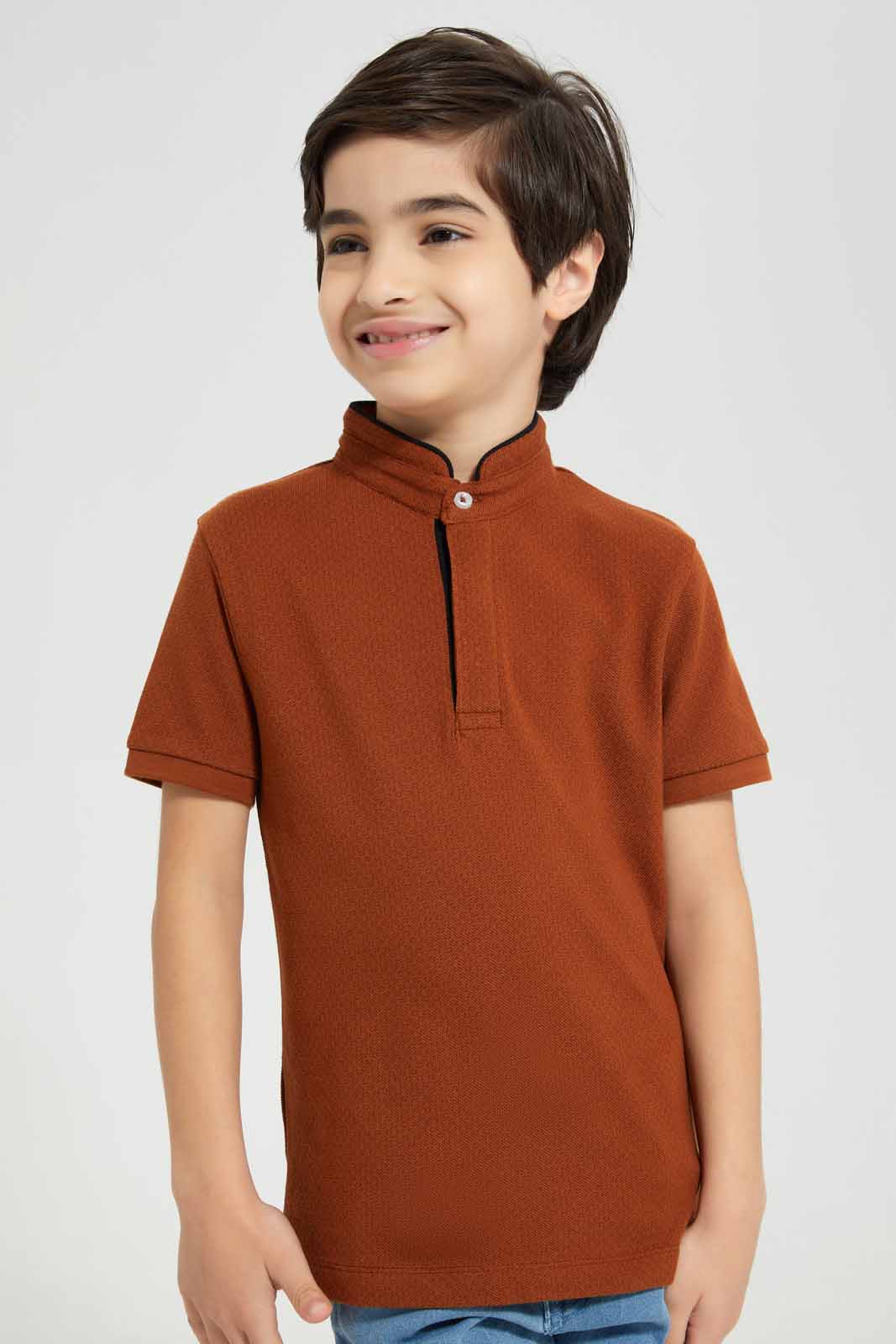 Redtag-Brown-AOP-Stand-Up-Collar-Polo-T-Shirt-BOY-Polo-T-Shirts,-Category:Polo-T-Shirts,-Colour:Brown,-Deals:New-In,-Filter:Boys-(2-to-8-Yrs),-New-In-BOY-APL,-Non-Sale,-Section:Boys-(0-to-14Yrs),-TBL,-W22A-Boys-2 to 8 Years