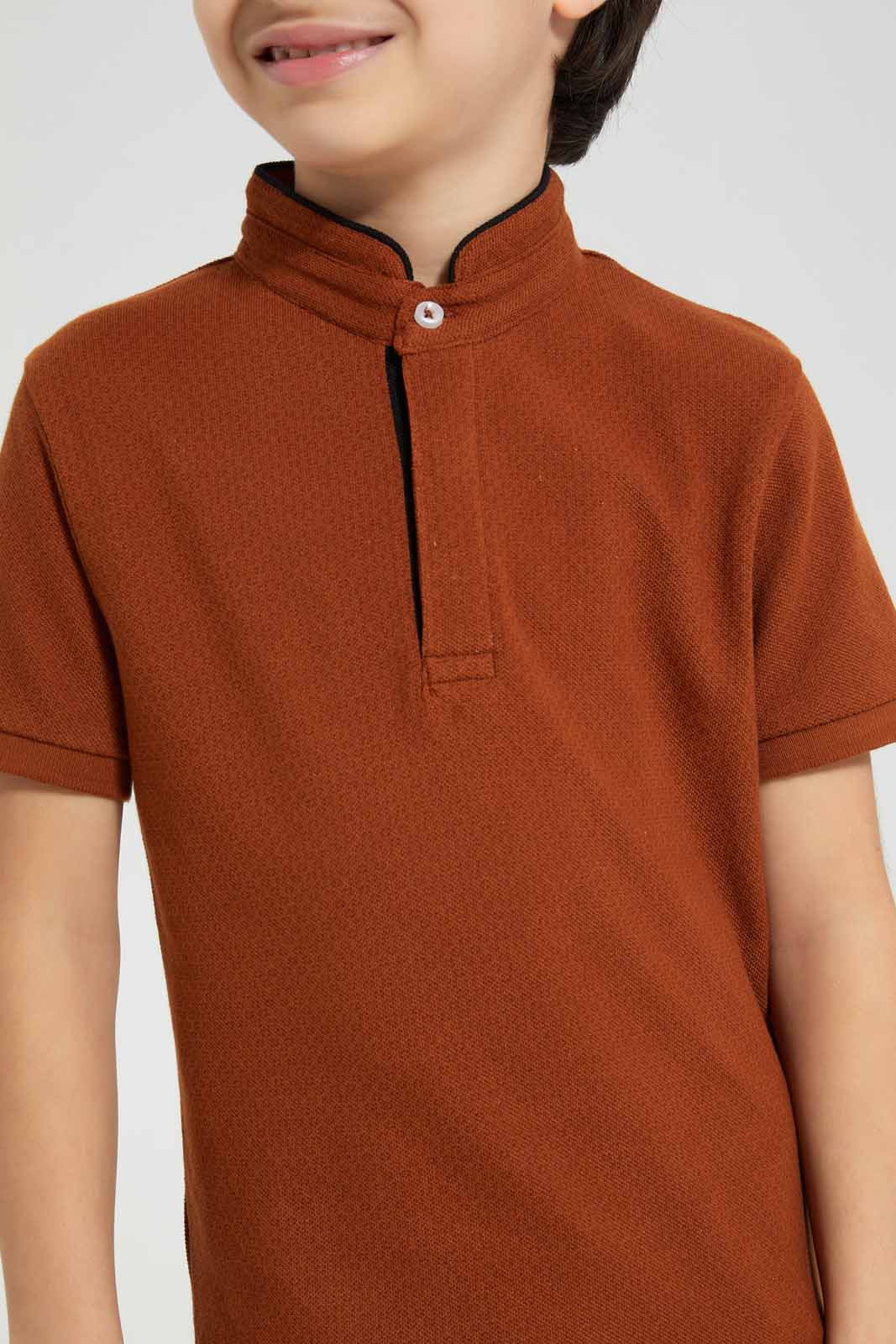 Redtag-Brown-AOP-Stand-Up-Collar-Polo-T-Shirt-BOY-Polo-T-Shirts,-Category:Polo-T-Shirts,-Colour:Brown,-Deals:New-In,-Filter:Boys-(2-to-8-Yrs),-New-In-BOY-APL,-Non-Sale,-Section:Boys-(0-to-14Yrs),-TBL,-W22A-Boys-2 to 8 Years