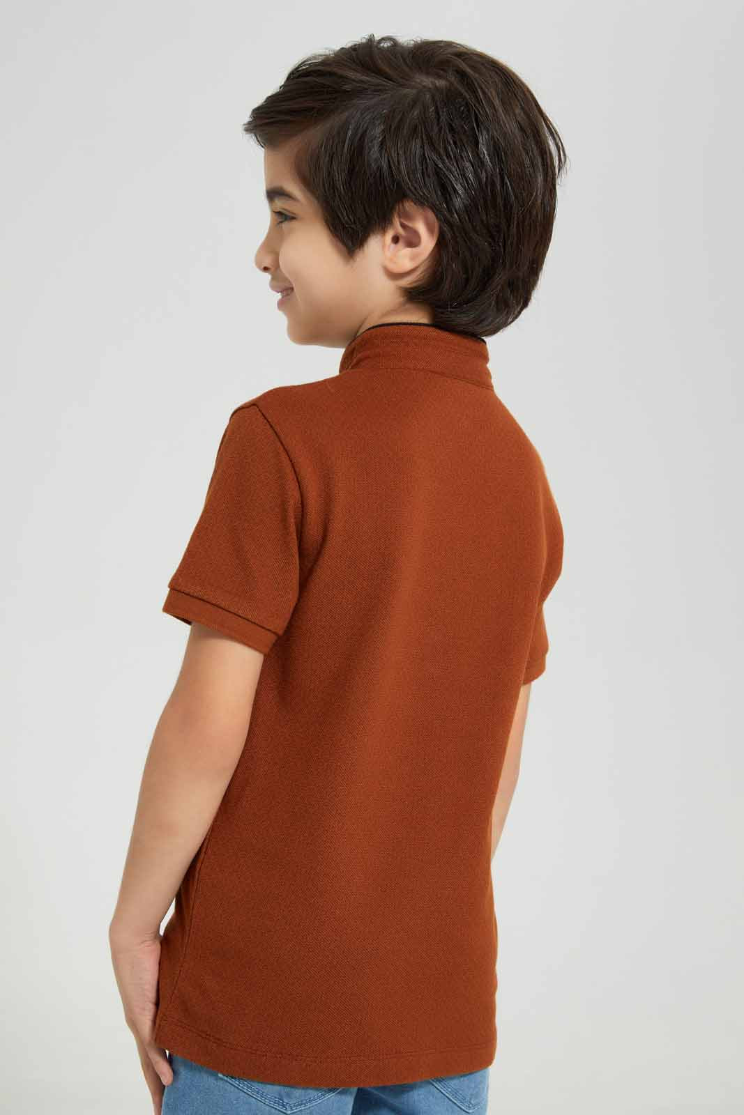 Redtag-Brown-AOP-Stand-Up-Collar-Polo-T-Shirt-BOY-Polo-T-Shirts,-Category:Polo-T-Shirts,-Colour:Brown,-Deals:New-In,-Filter:Boys-(2-to-8-Yrs),-New-In-BOY-APL,-Non-Sale,-Section:Boys-(0-to-14Yrs),-TBL,-W22A-Boys-2 to 8 Years