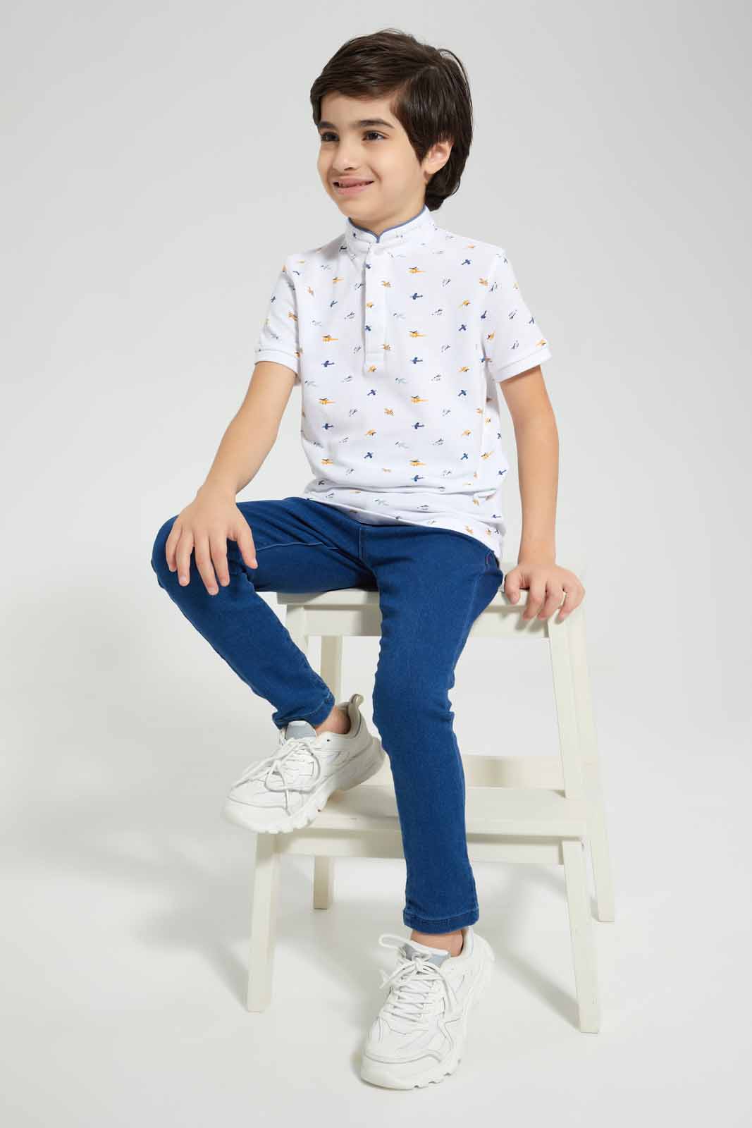 Redtag-White-AOP-Stand-Up-Collar-Polo-T-Shirt-BOY-Polo-T-Shirts,-Category:Polo-T-Shirts,-Colour:White,-Deals:New-In,-Filter:Boys-(2-to-8-Yrs),-New-In-BOY-APL,-Non-Sale,-Section:Boys-(0-to-14Yrs),-TBL,-W22A-Boys-2 to 8 Years