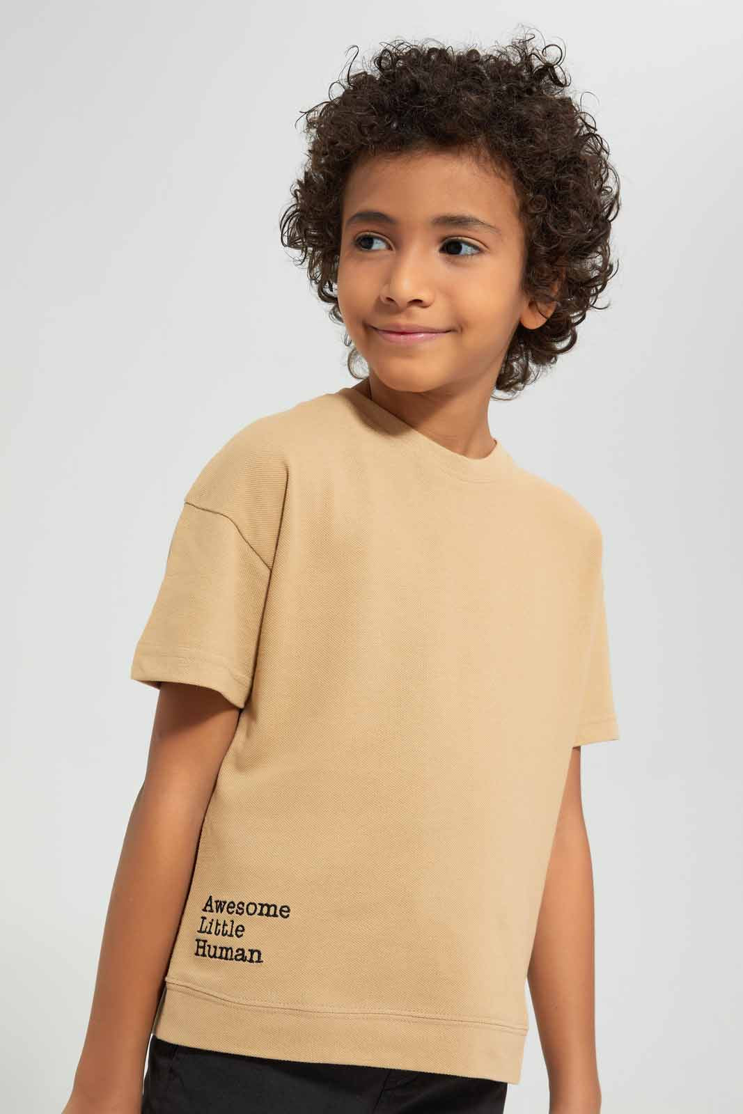 Redtag-Beige-Short-Sleeve-Pique-Over-Size-Embroidered-T-Shirt-BOY-T-Shirts,-Category:T-Shirts,-Colour:Beige,-Deals:New-In,-Filter:Boys-(2-to-8-Yrs),-New-In-BOY-APL,-Non-Sale,-Section:Boys-(0-to-14Yrs),-TBL,-W22A-Boys-2 to 8 Years