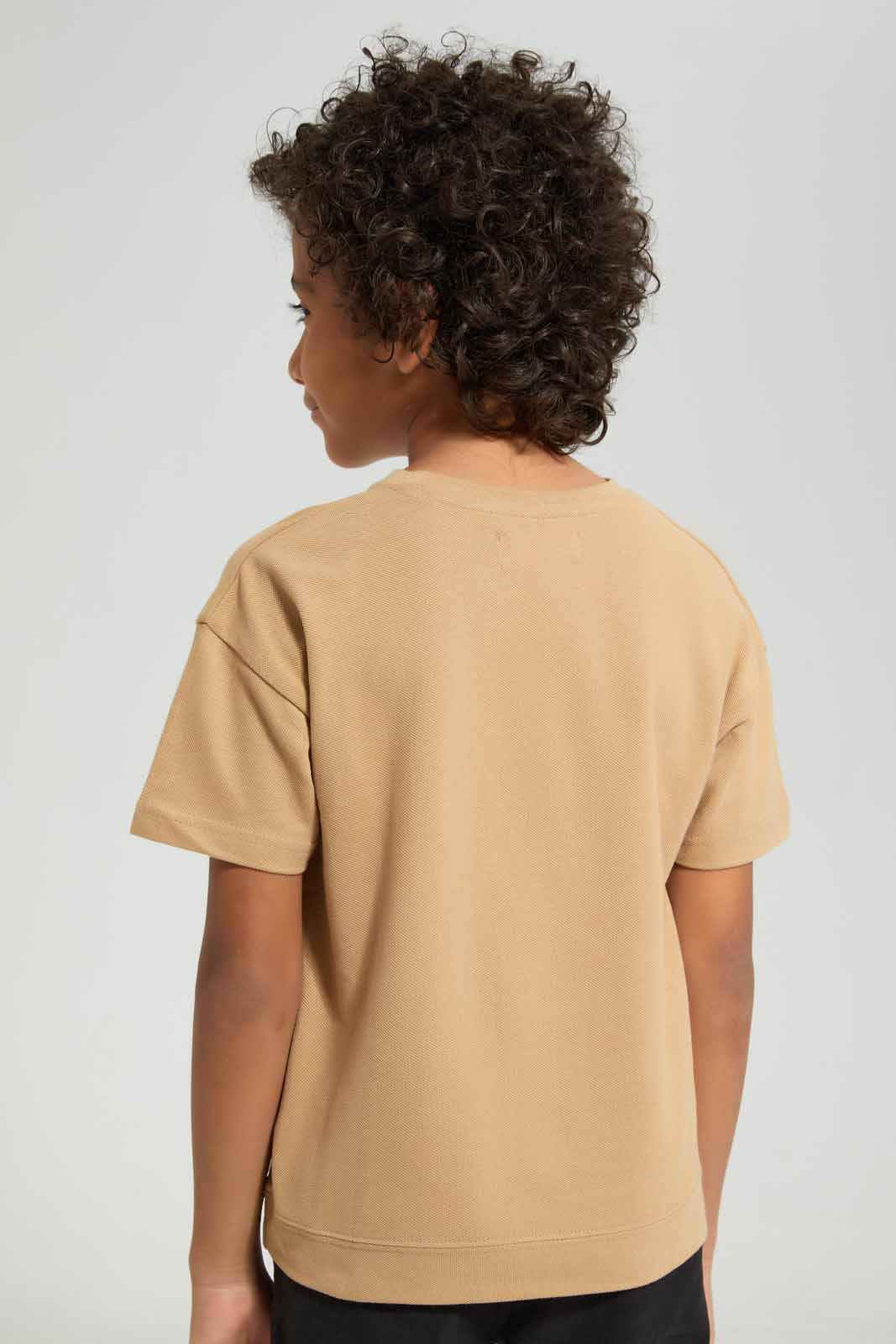 Redtag-Beige-Short-Sleeve-Pique-Over-Size-Embroidered-T-Shirt-BOY-T-Shirts,-Category:T-Shirts,-Colour:Beige,-Deals:New-In,-Filter:Boys-(2-to-8-Yrs),-New-In-BOY-APL,-Non-Sale,-Section:Boys-(0-to-14Yrs),-TBL,-W22A-Boys-2 to 8 Years