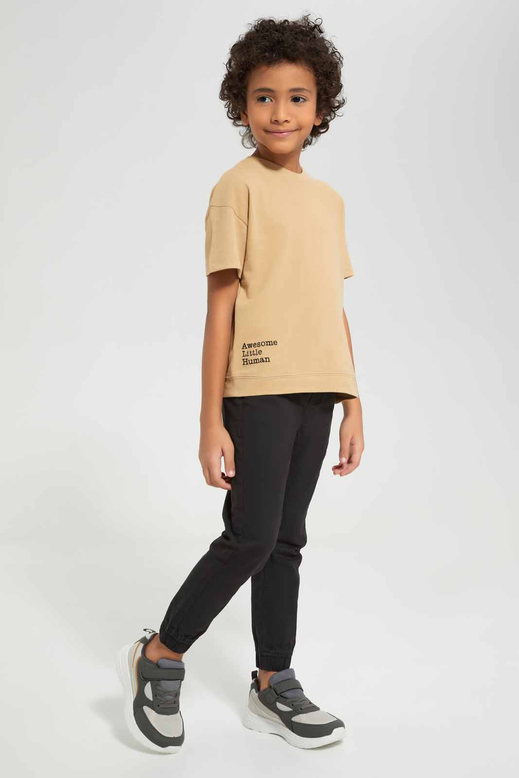 Redtag-Beige-Short-Sleeve-Pique-Over-Size-Embroidered-T-Shirt-BOY-T-Shirts,-Category:T-Shirts,-Colour:Beige,-Deals:New-In,-Filter:Boys-(2-to-8-Yrs),-New-In-BOY-APL,-Non-Sale,-Section:Boys-(0-to-14Yrs),-TBL,-W22A-Boys-2 to 8 Years