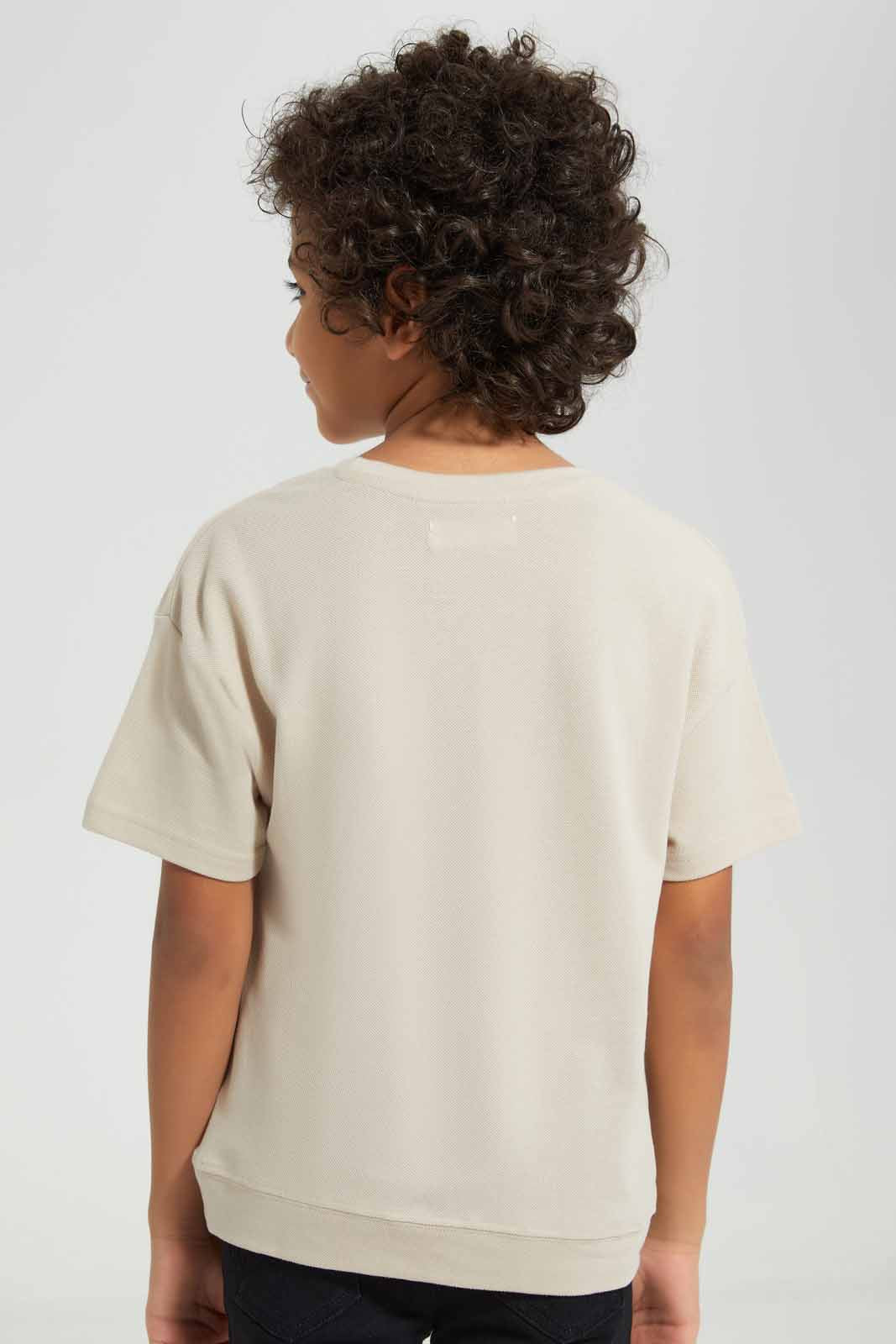 Redtag-Ecru-Short-Sleeve-Pique-Over-Size-Embroidered-T-Shirt-BOY-T-Shirts,-Category:T-Shirts,-Colour:Ecru,-Deals:New-In,-Filter:Boys-(2-to-8-Yrs),-New-In-BOY-APL,-Non-Sale,-Section:Boys-(0-to-14Yrs),-TBL,-W22A-Boys-2 to 8 Years