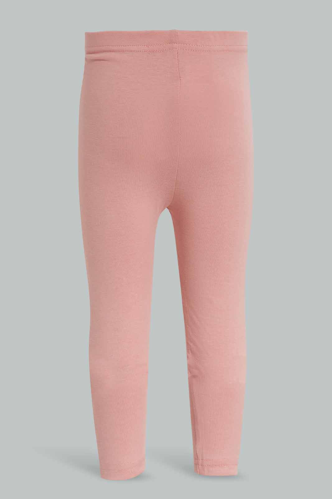 Redtag-Pink-Solid-Legging-With-Motif-Category:Leggings,-Colour:Apricot,-Deals:New-In,-Filter:Infant-Girls-(3-to-24-Mths),-ING-Leggings,-New-In-ING-APL,-Non-Sale,-Section:Girls-(0-to-14Yrs),-TBL,-W22A-Infant-Girls-3 to 24 Months