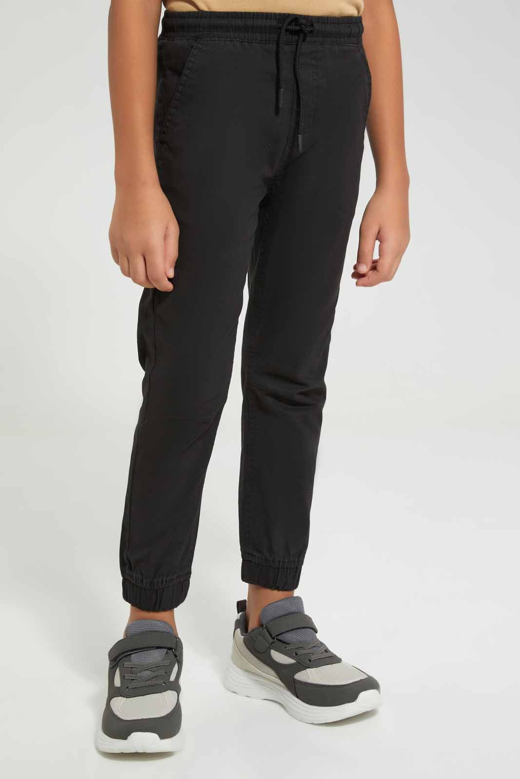 Redtag-Black-Twill-Stretch-Jogger-BOY-Trousers,-Category:Trousers,-Colour:Black,-Deals:New-In,-Filter:Boys-(2-to-8-Yrs),-New-In-BOY-APL,-Non-Sale,-Section:Boys-(0-to-14Yrs),-TBL,-W22A-Boys-2 to 8 Years