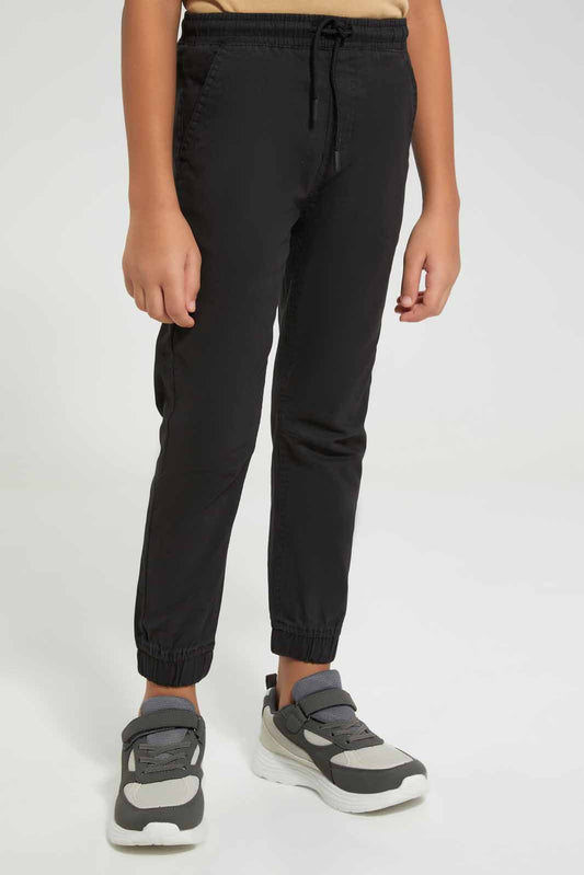 Redtag-Black-Twill-Stretch-Jogger-BOY-Trousers,-Category:Trousers,-Colour:Black,-Deals:New-In,-Filter:Boys-(2-to-8-Yrs),-New-In-BOY-APL,-Non-Sale,-Section:Boys-(0-to-14Yrs),-TBL,-W22A-Boys-2 to 8 Years