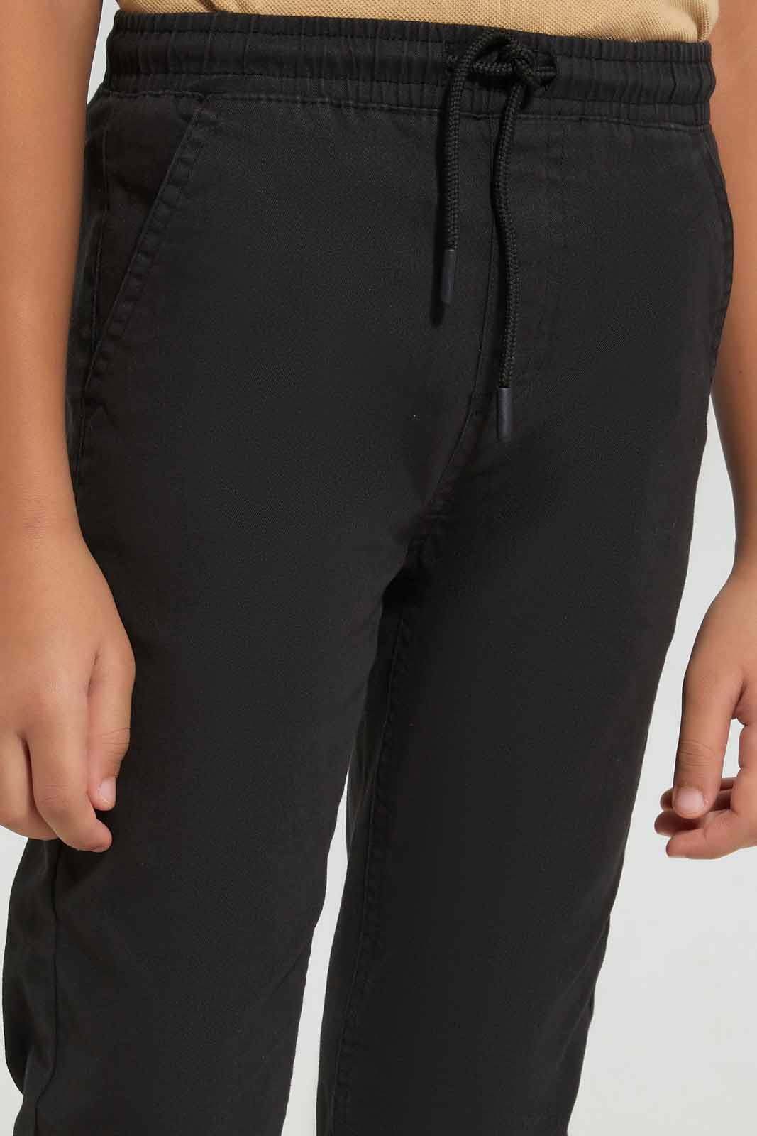 Redtag-Black-Twill-Stretch-Jogger-BOY-Trousers,-Category:Trousers,-Colour:Black,-Deals:New-In,-Filter:Boys-(2-to-8-Yrs),-New-In-BOY-APL,-Non-Sale,-Section:Boys-(0-to-14Yrs),-TBL,-W22A-Boys-2 to 8 Years