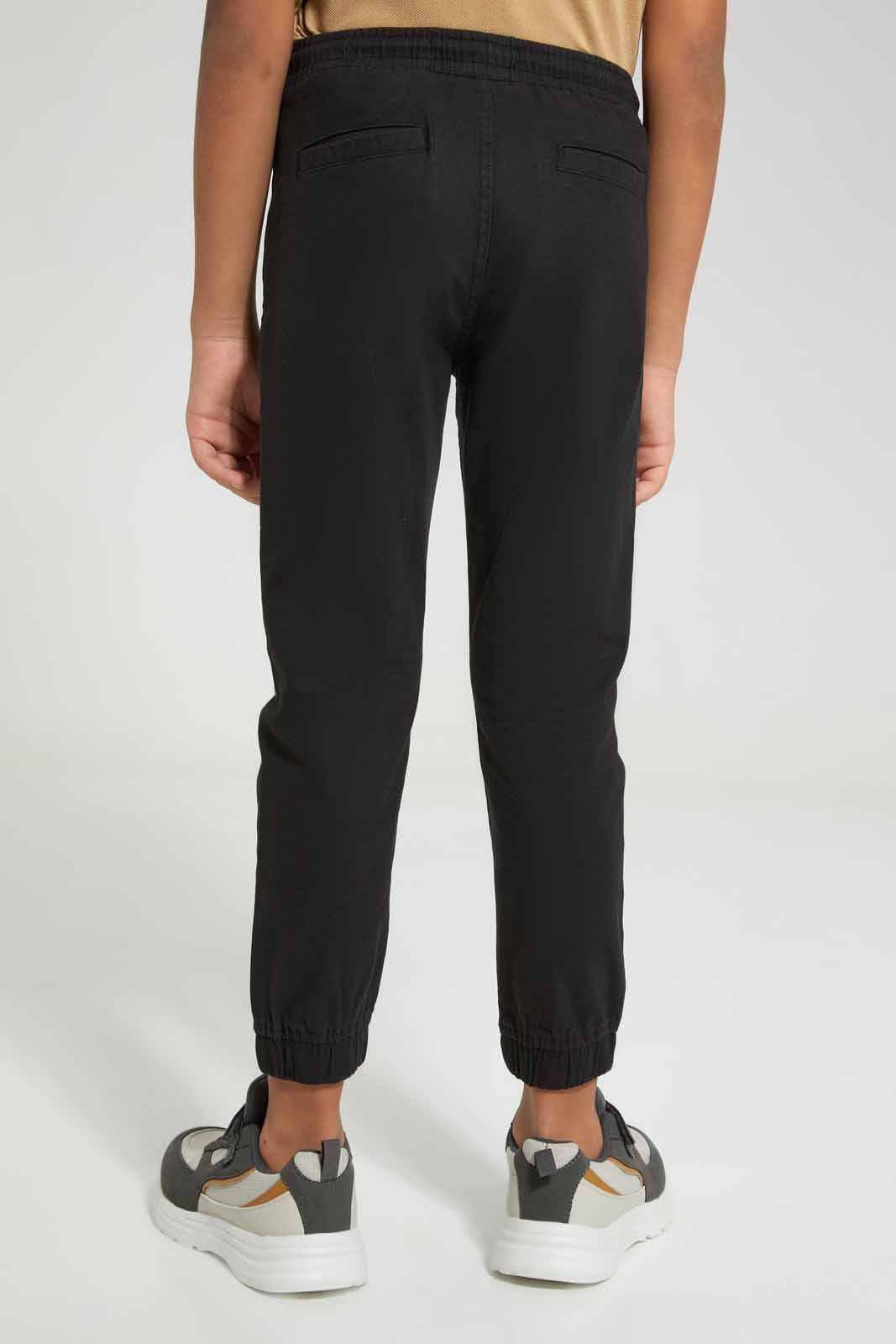 Redtag-Black-Twill-Stretch-Jogger-BOY-Trousers,-Category:Trousers,-Colour:Black,-Deals:New-In,-Filter:Boys-(2-to-8-Yrs),-New-In-BOY-APL,-Non-Sale,-Section:Boys-(0-to-14Yrs),-TBL,-W22A-Boys-2 to 8 Years