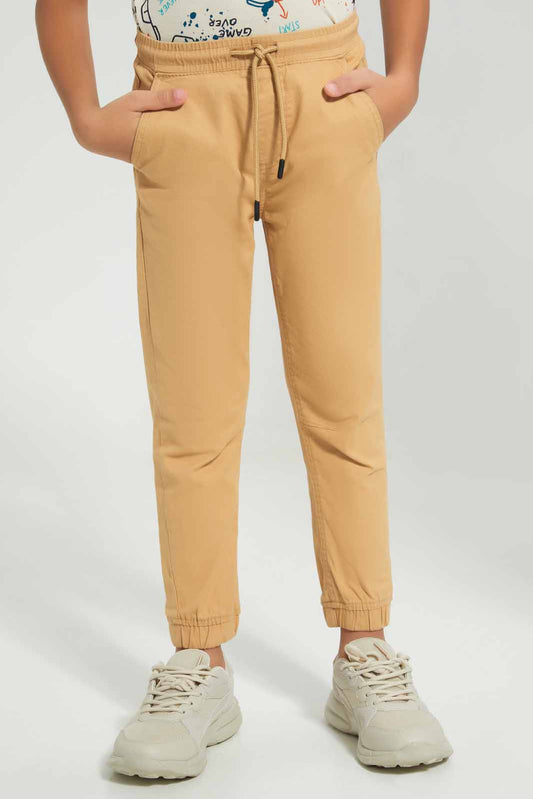 Redtag-Beige-Twill-Stretch-Jogger-BOY-Trousers,-Category:Trousers,-Colour:Beige,-Deals:New-In,-Filter:Boys-(2-to-8-Yrs),-New-In-BOY-APL,-Non-Sale,-Section:Boys-(0-to-14Yrs),-TBL,-W22A-Boys-2 to 8 Years