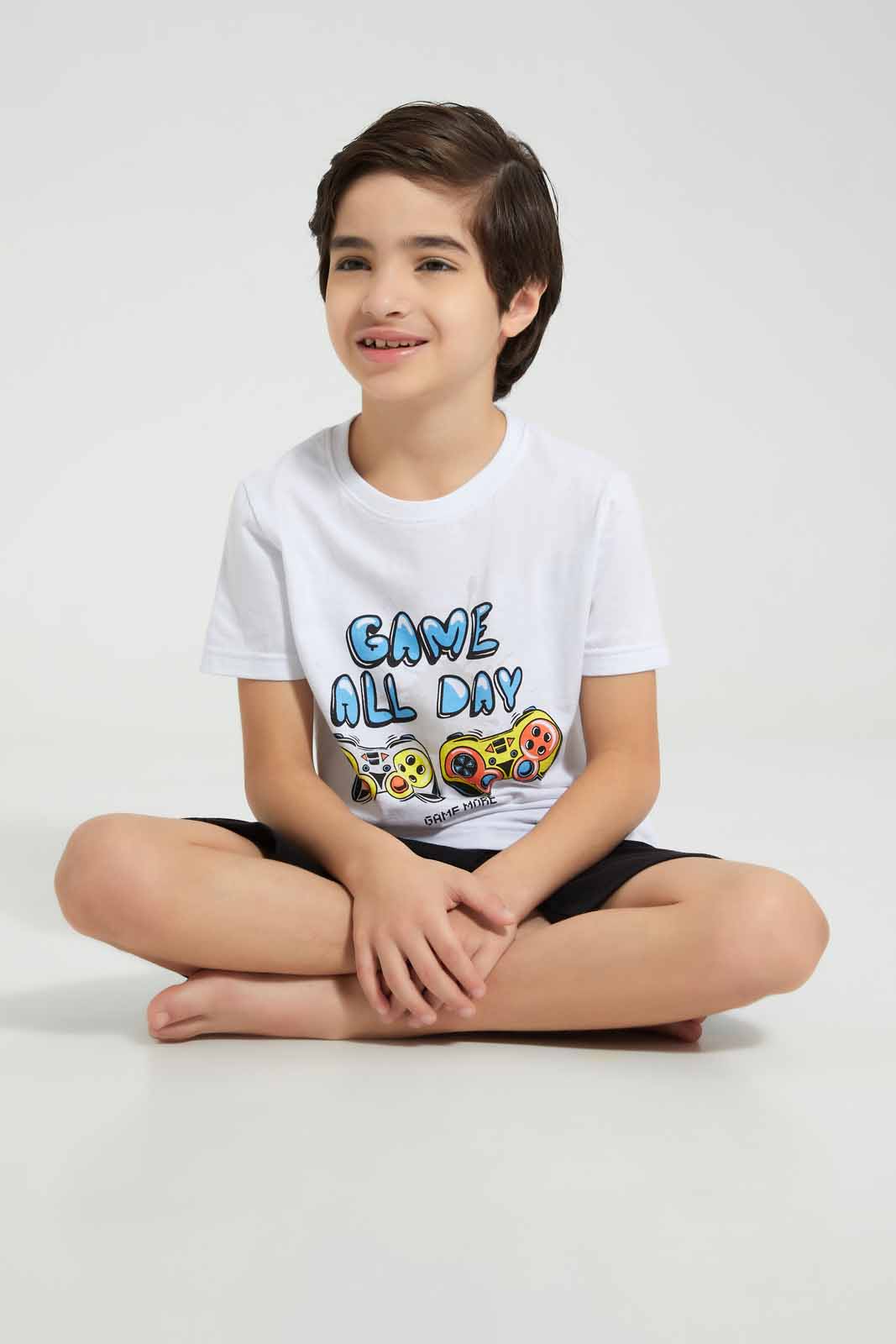 Redtag-White-Game-Print-T-Shirt-And-Short-Pyjama-BOY-Pyjama-Sets,-Category:Pyjama-Sets,-Colour:White,-Deals:New-In,-Filter:Boys-(2-to-8-Yrs),-New-In-BOY-APL,-Non-Sale,-Section:Boys-(0-to-14Yrs),-VLM,-W22O-Boys-2 to 8 Years