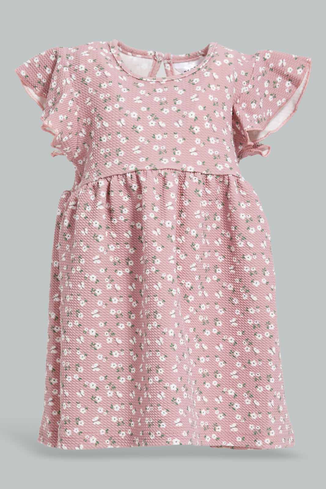 Redtag-Pink-Floral-AOP-Dress-Category:Dresses,-Colour:Apricot,-Deals:New-In,-Dept:Girls,-Filter:Infant-Girls-(3-to-24-Mths),-ING-Dresses,-New-In-ING-APL,-Non-Sale,-Section:Girls-(0-to-14Yrs),-W22A-Infant-Girls-3 to 24 Months