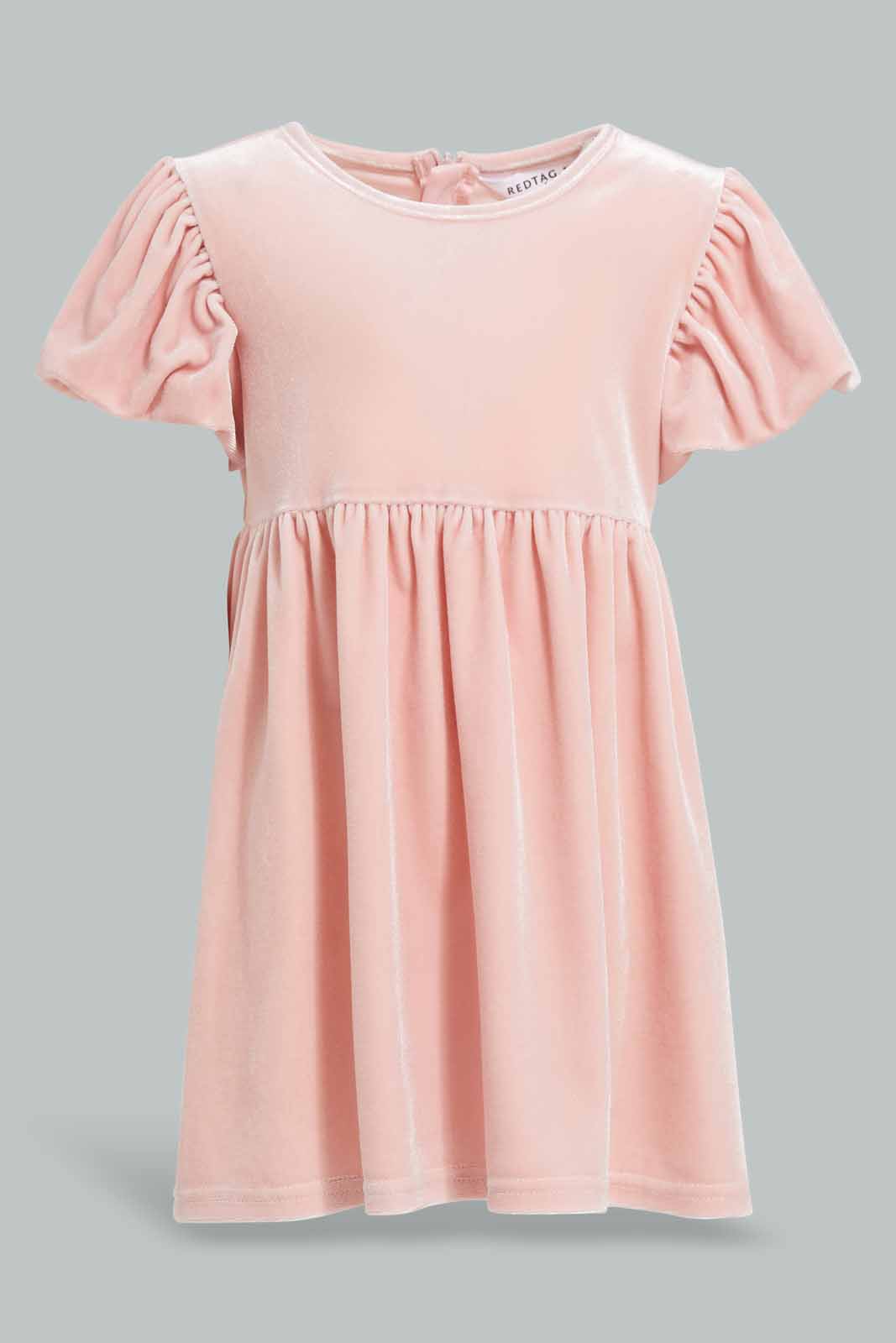 Redtag-Pink-Puff-Sleves-Velvet-Dress-Category:Dresses,-Colour:Apricot,-Deals:New-In,-Filter:Infant-Girls-(3-to-24-Mths),-ING-Dresses,-New-In-ING-APL,-Non-Sale,-Section:Girls-(0-to-14Yrs),-W22A-Infant-Girls-3 to 24 Months
