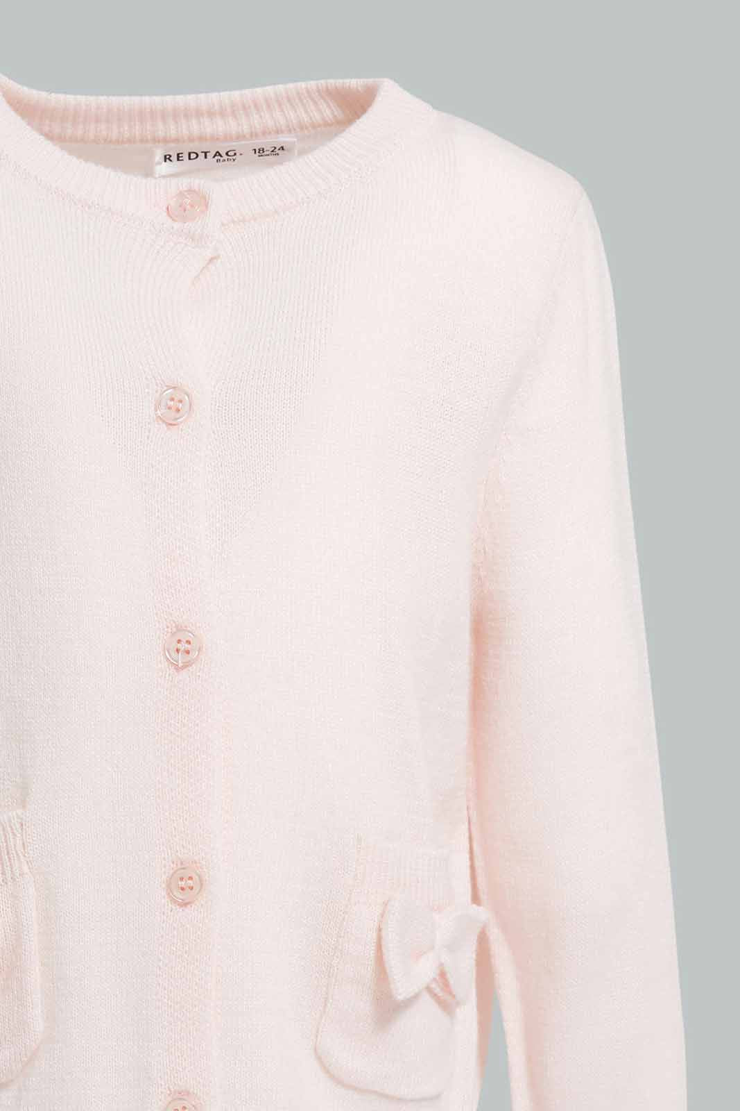 Redtag-Baby-Pink-Bow-Detail-Pocket-Cardigan-Category:Cardigans,-Colour:Apricot,-Deals:New-In,-Filter:Infant-Girls-(3-to-24-Mths),-ING-Cardigans,-New-In-ING-APL,-Non-Sale,-Section:Girls-(0-to-14Yrs),-W22A-Infant-Girls-3 to 24 Months